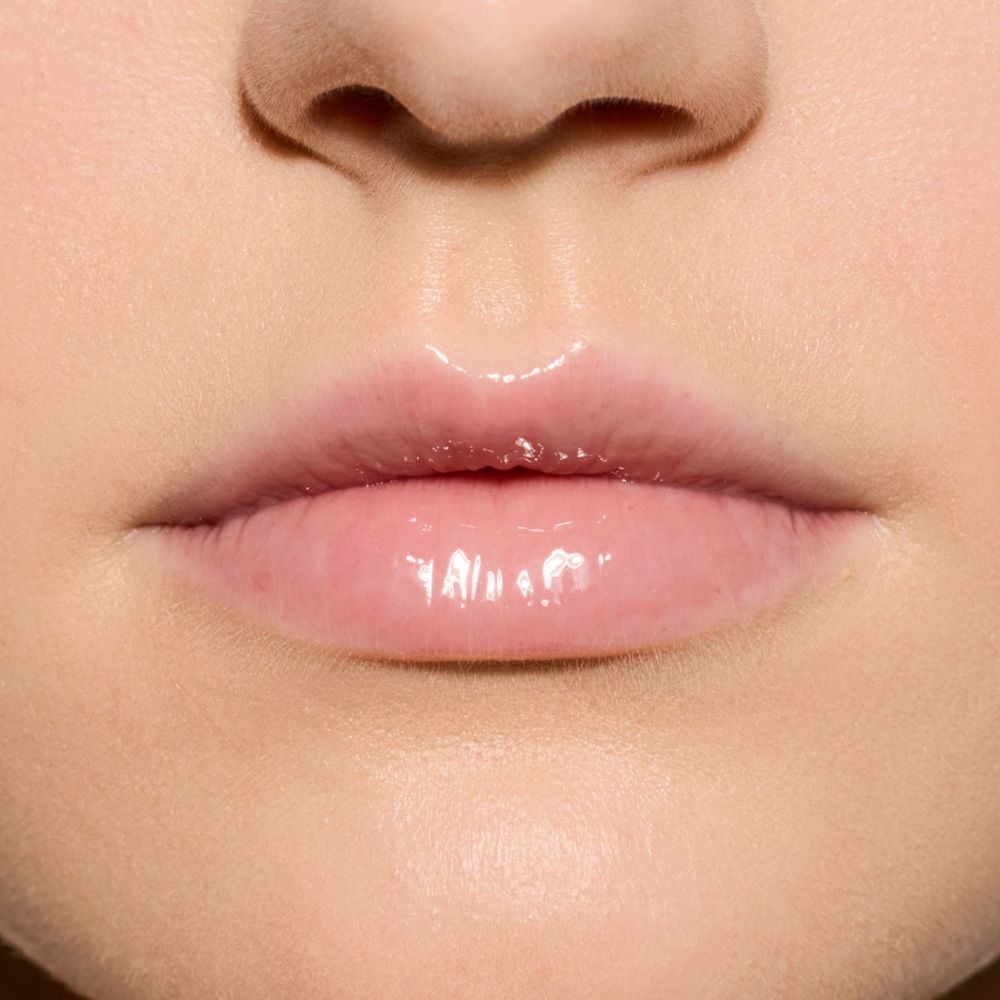 Fenty Treatz Hydrating + Strengthening Lip Oil • Coconut