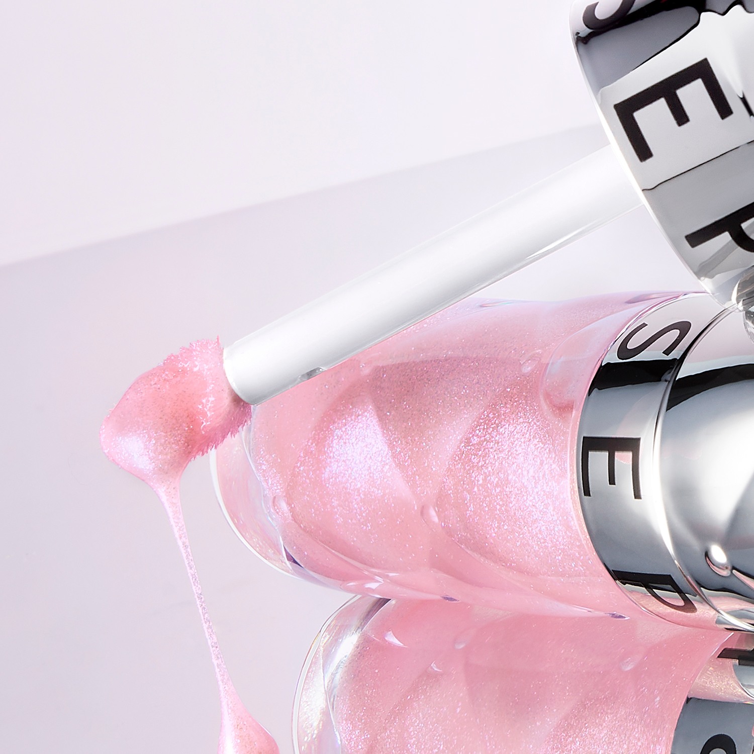 New Outrageous Plump Lip Gloss • 08 Sparkling Dawn