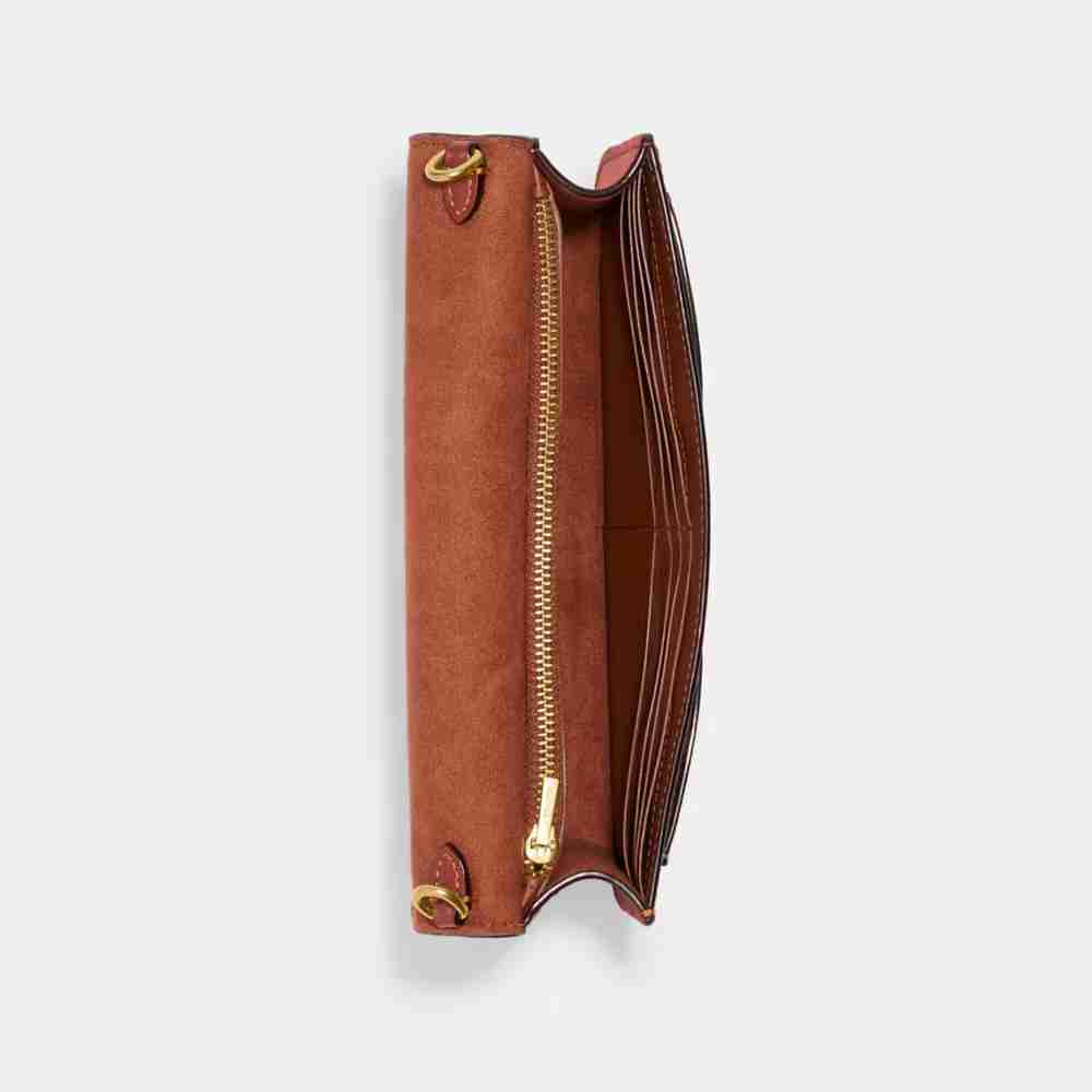 Tabby Chain Clutch In Signature Canvas