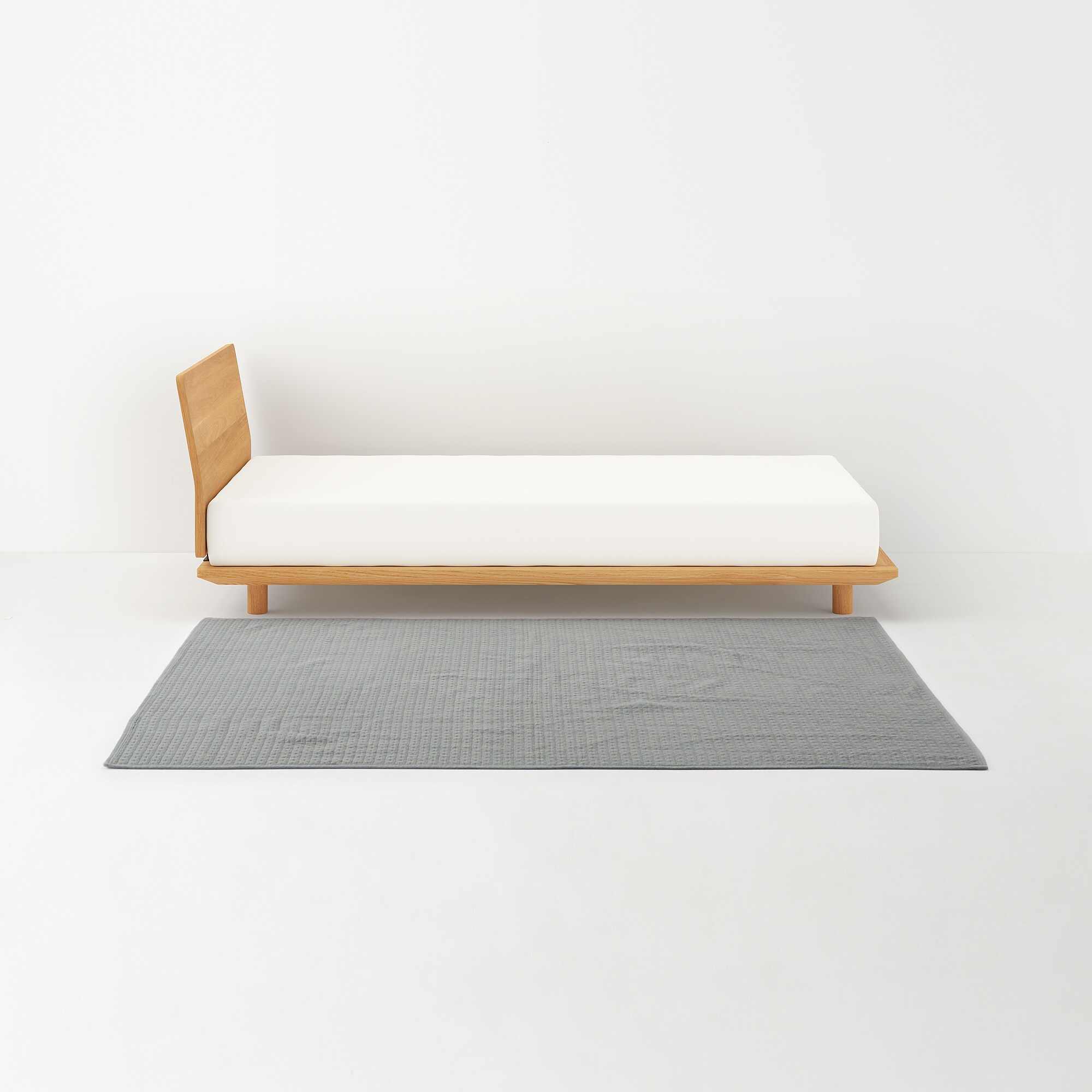 WASHED COTTON QUILTED RUG