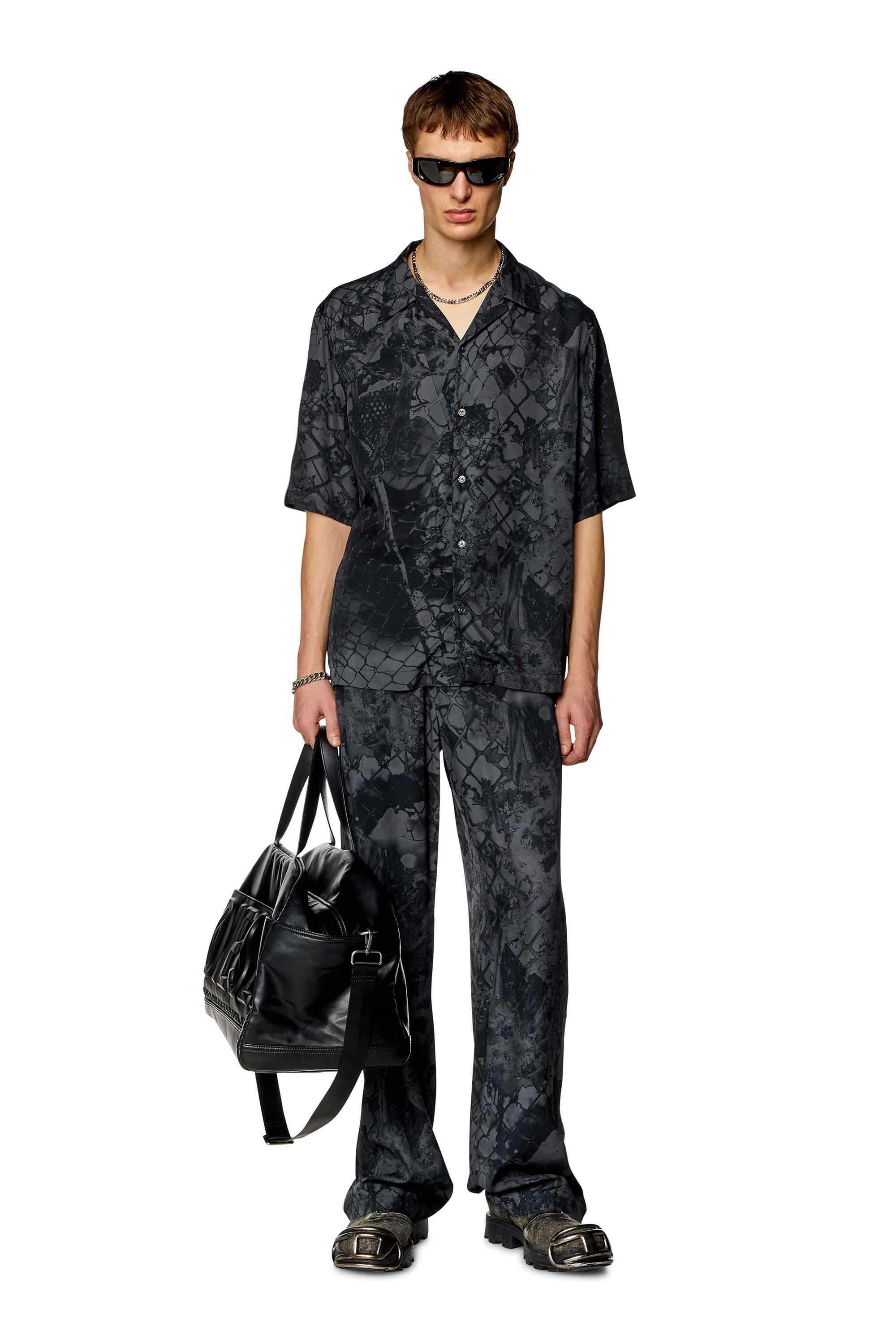 Black Fluid pants with abstract print