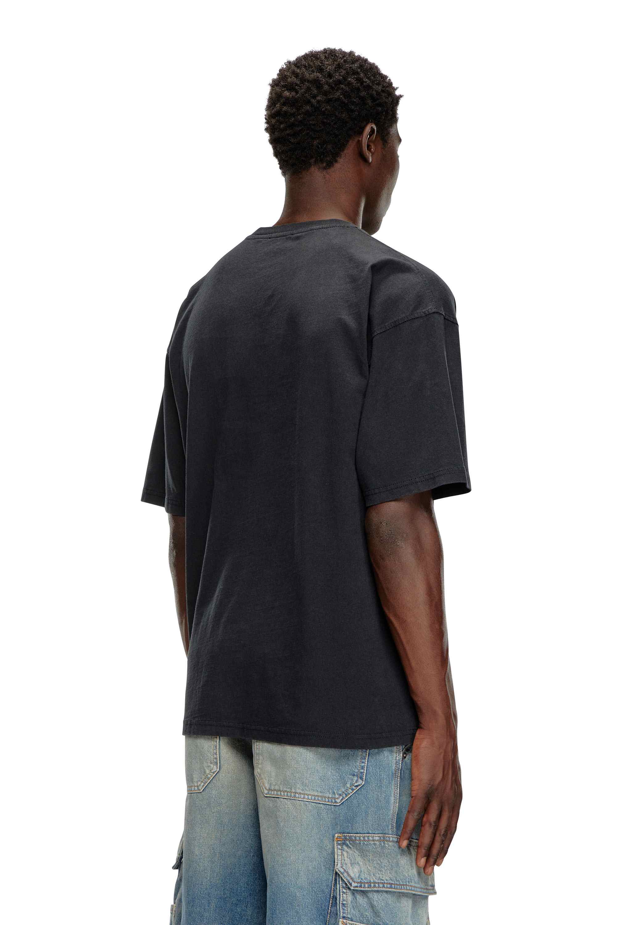 Black T-shirt with distressed flocked logo