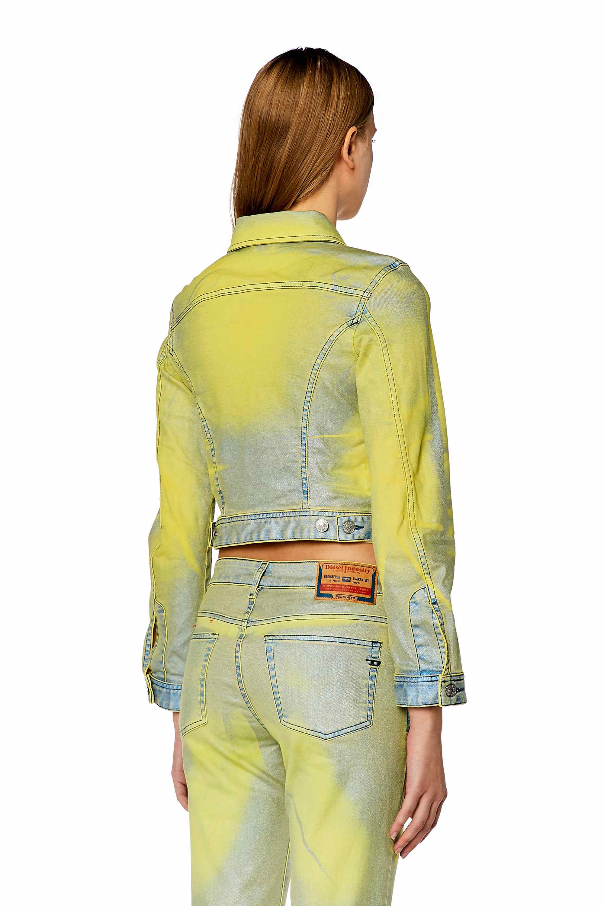 Blue Trucker jacket in bicolour laminated denim