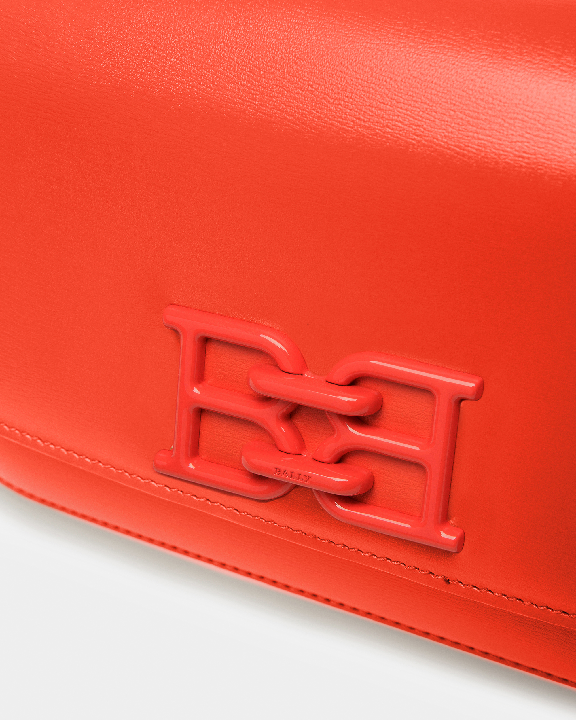 Brodye Leather Crossbody Bag In Orange