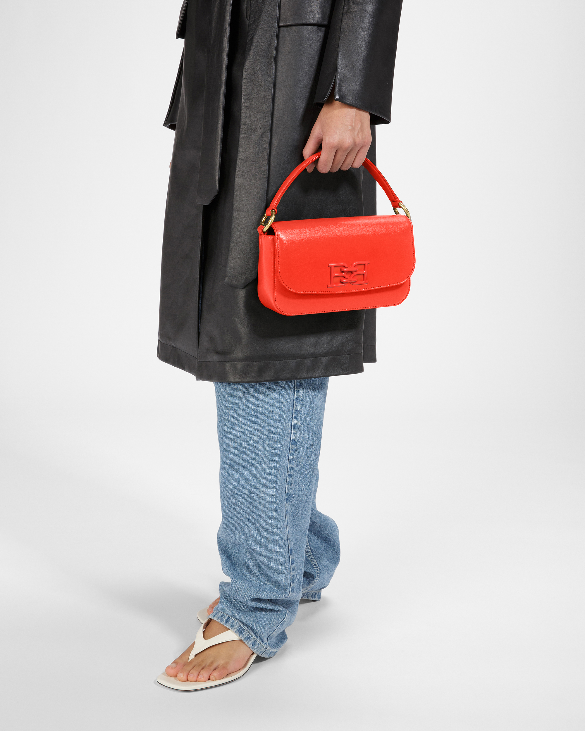 Brodye Leather Crossbody Bag In Orange