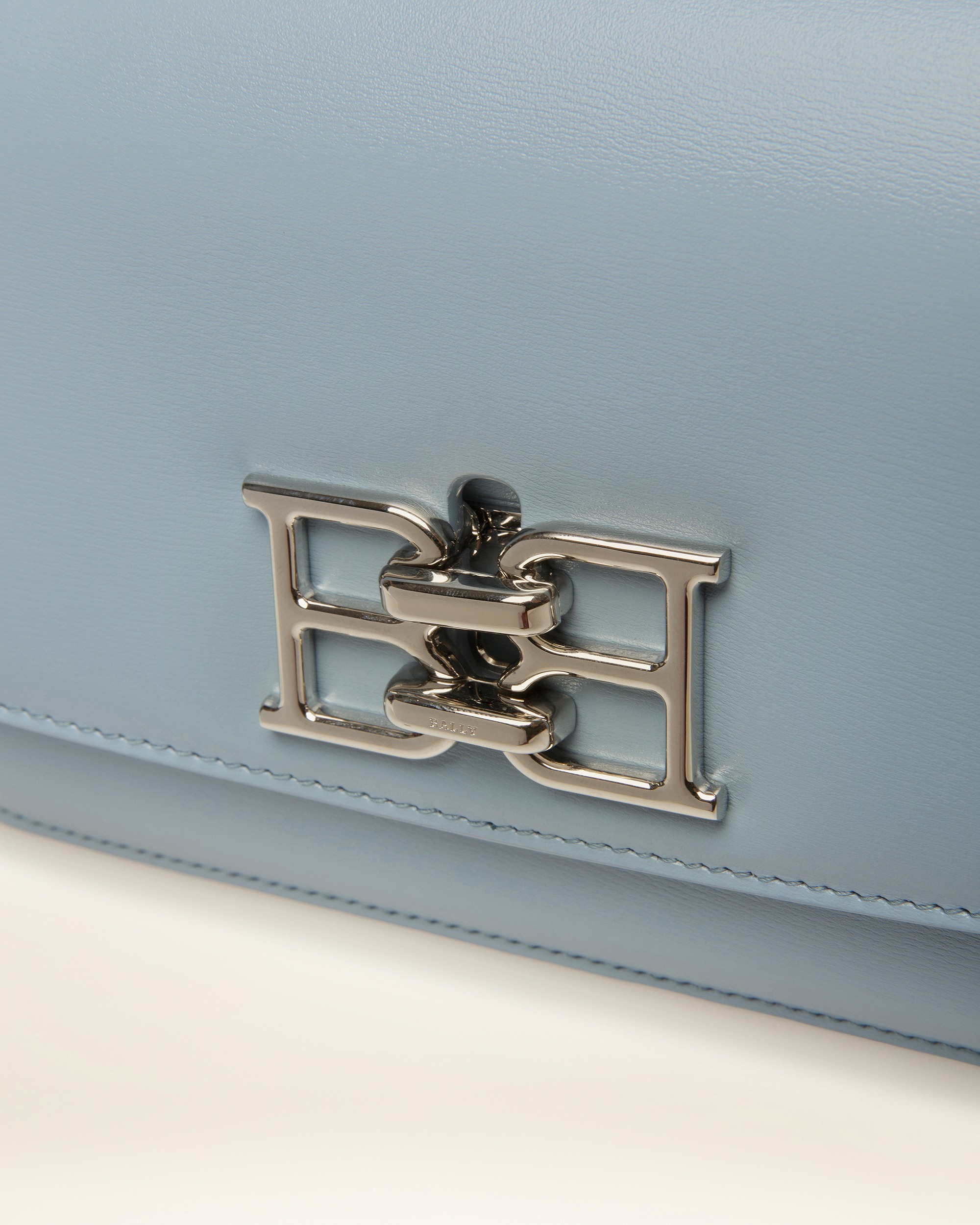 Brodye Leather Crossbody Bag In Light Blue