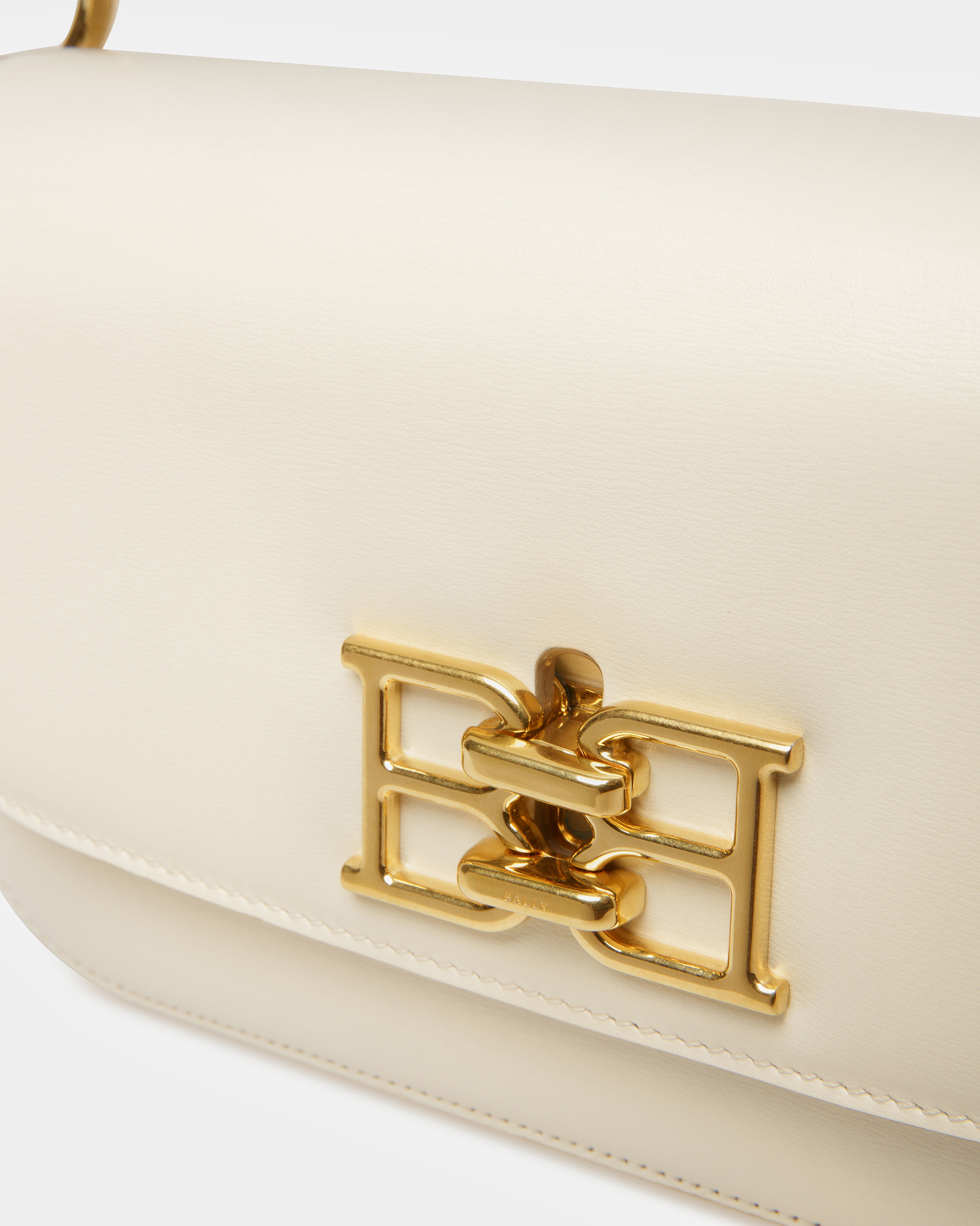 Brodye Leather Crossbody Bag In Bone