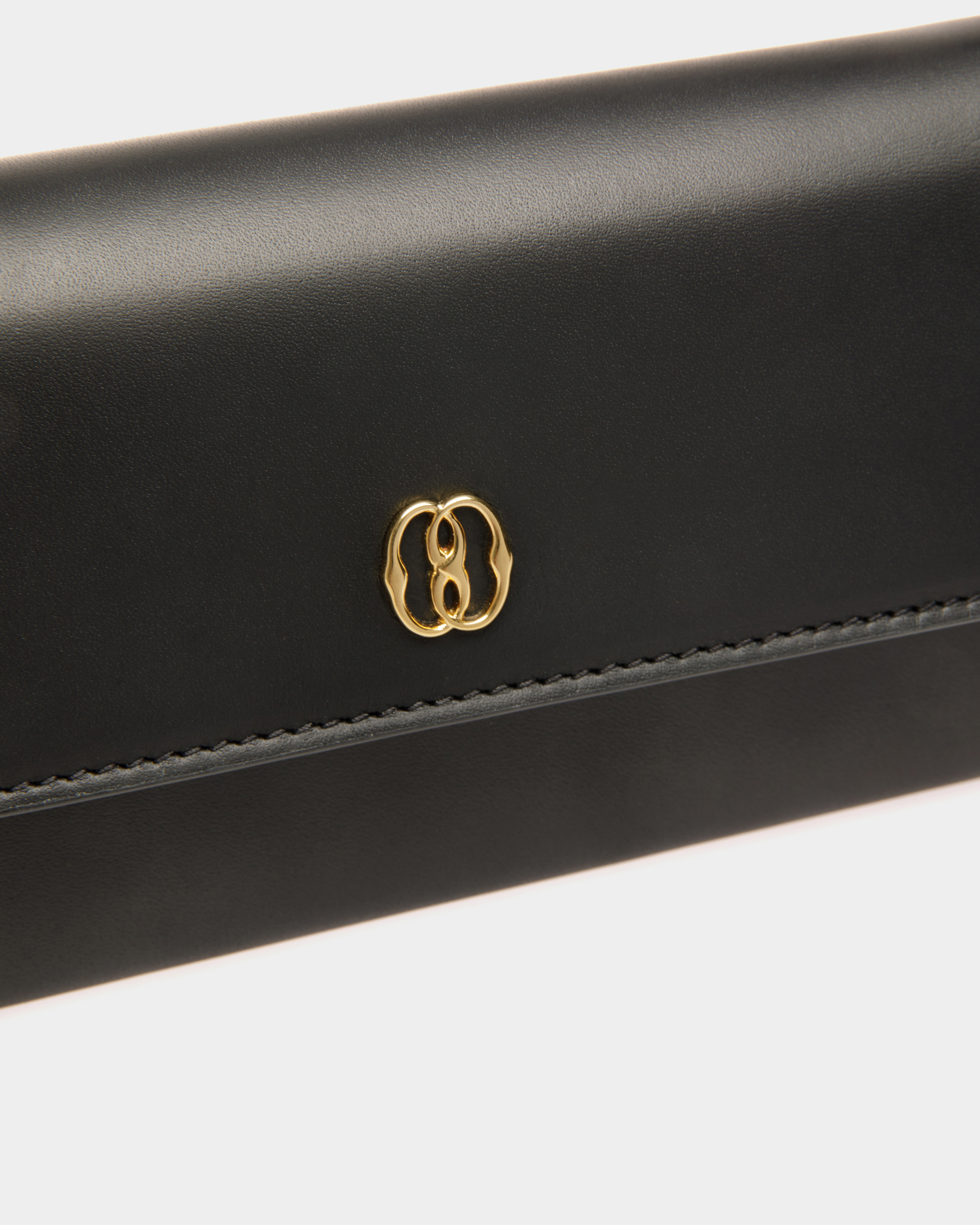 Emblem Travel Wallet In Black Leather