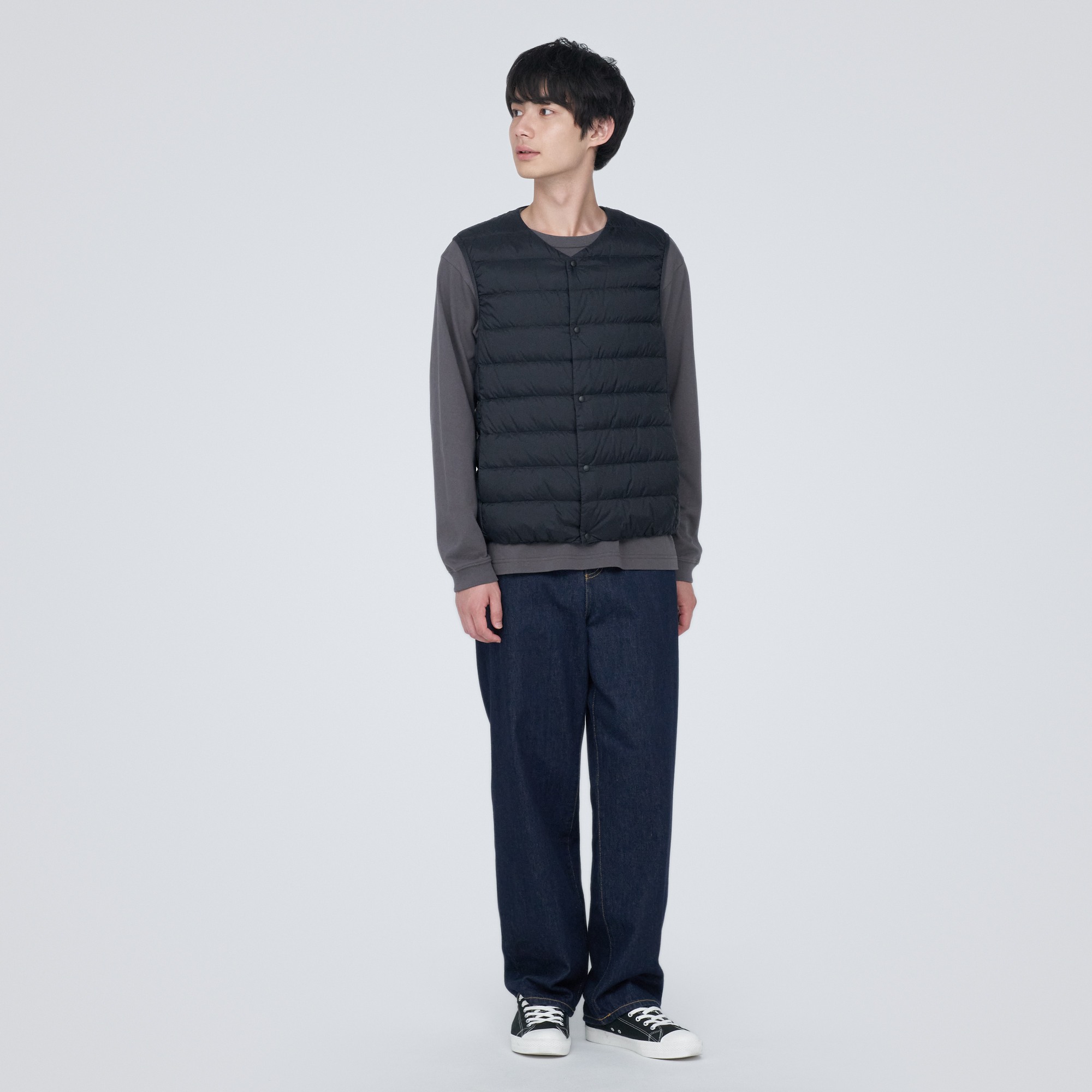 Light weight pocketable Collarless down vest