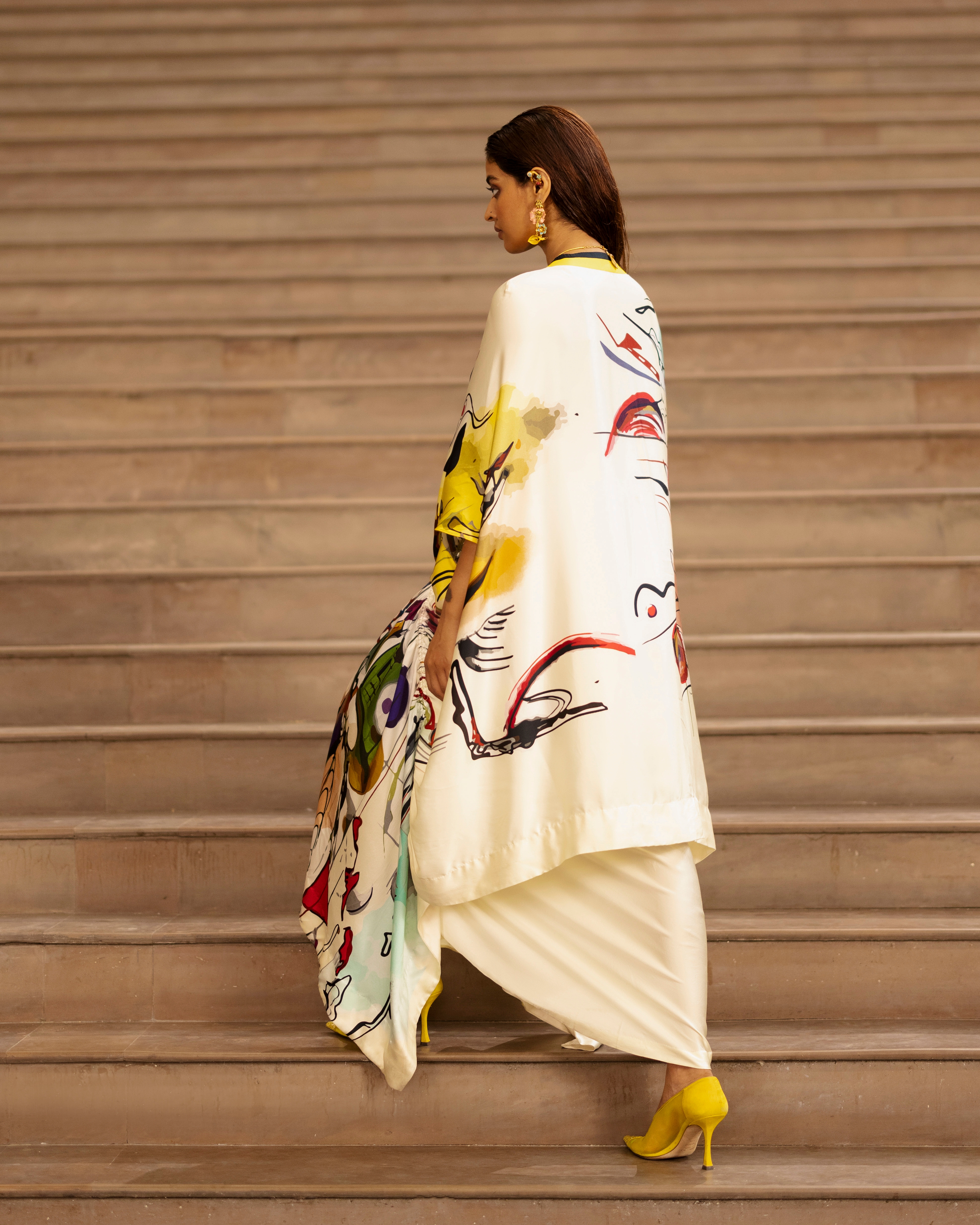 GRAPHIC DRAWSTRING CAPE WITH SKIRT