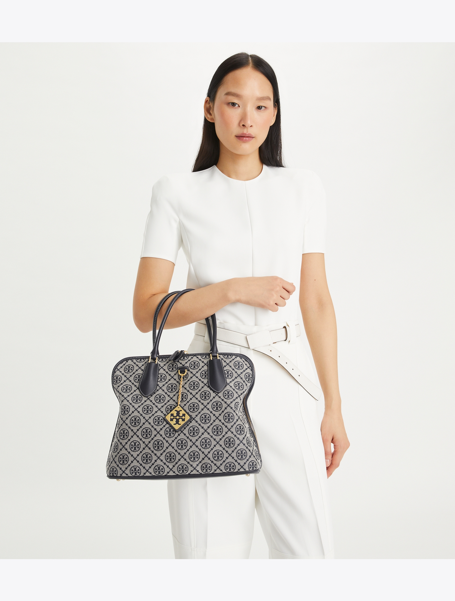 T MONOGRAM SWING BAG