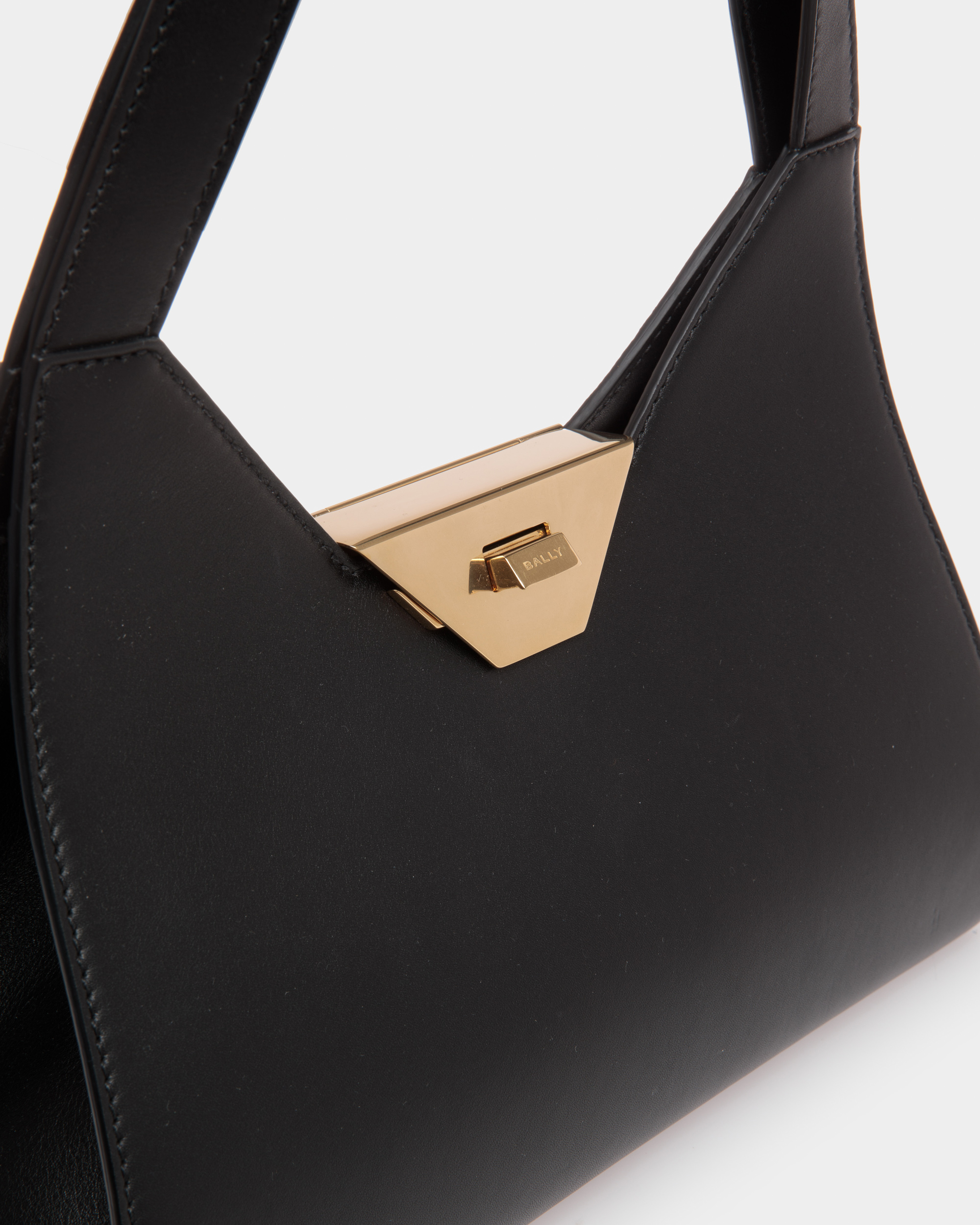 Tilt Shoulder Bag in Black Leather