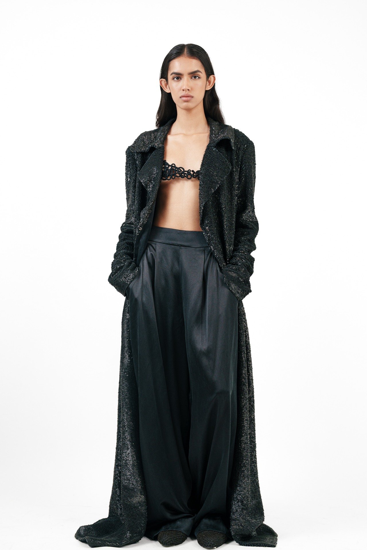 Long Black Jacket with Leather Stacking with Cord Bra Top and Silk Broad Trouser