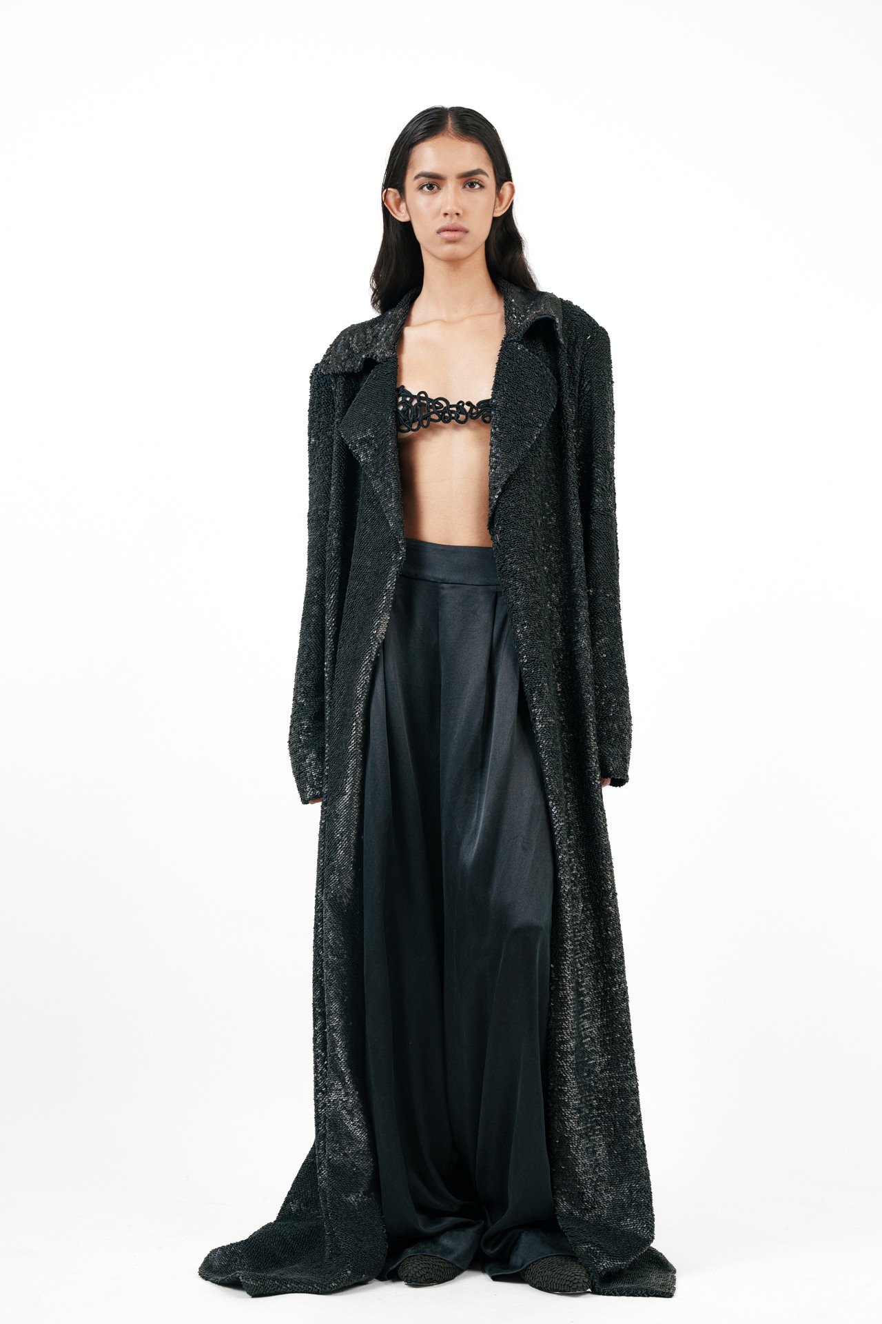 Long Black Jacket with Leather Stacking with Cord Bra Top and Silk Broad Trouser