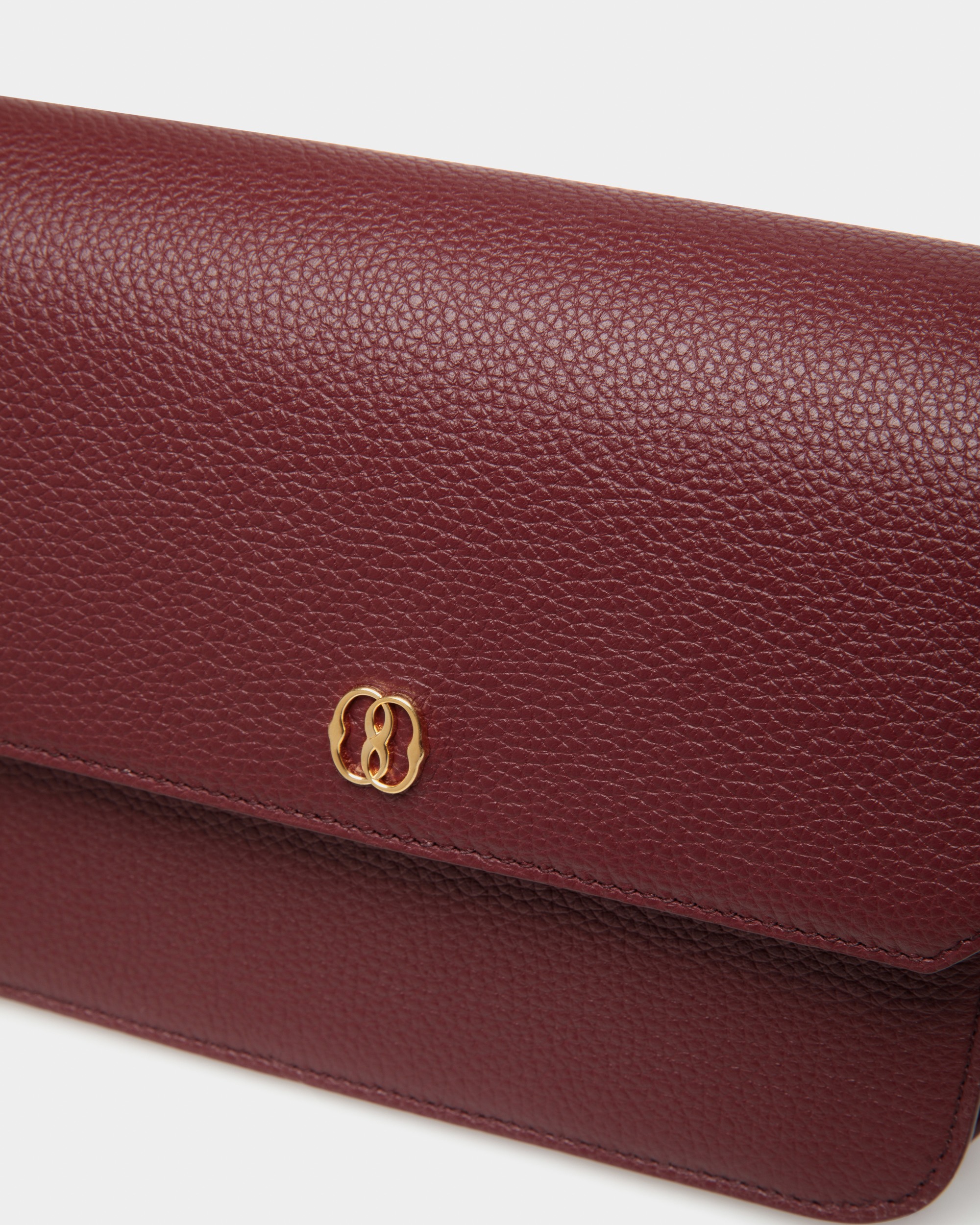 Emblem Small Crossbody Bag in Andorra Grained Leather