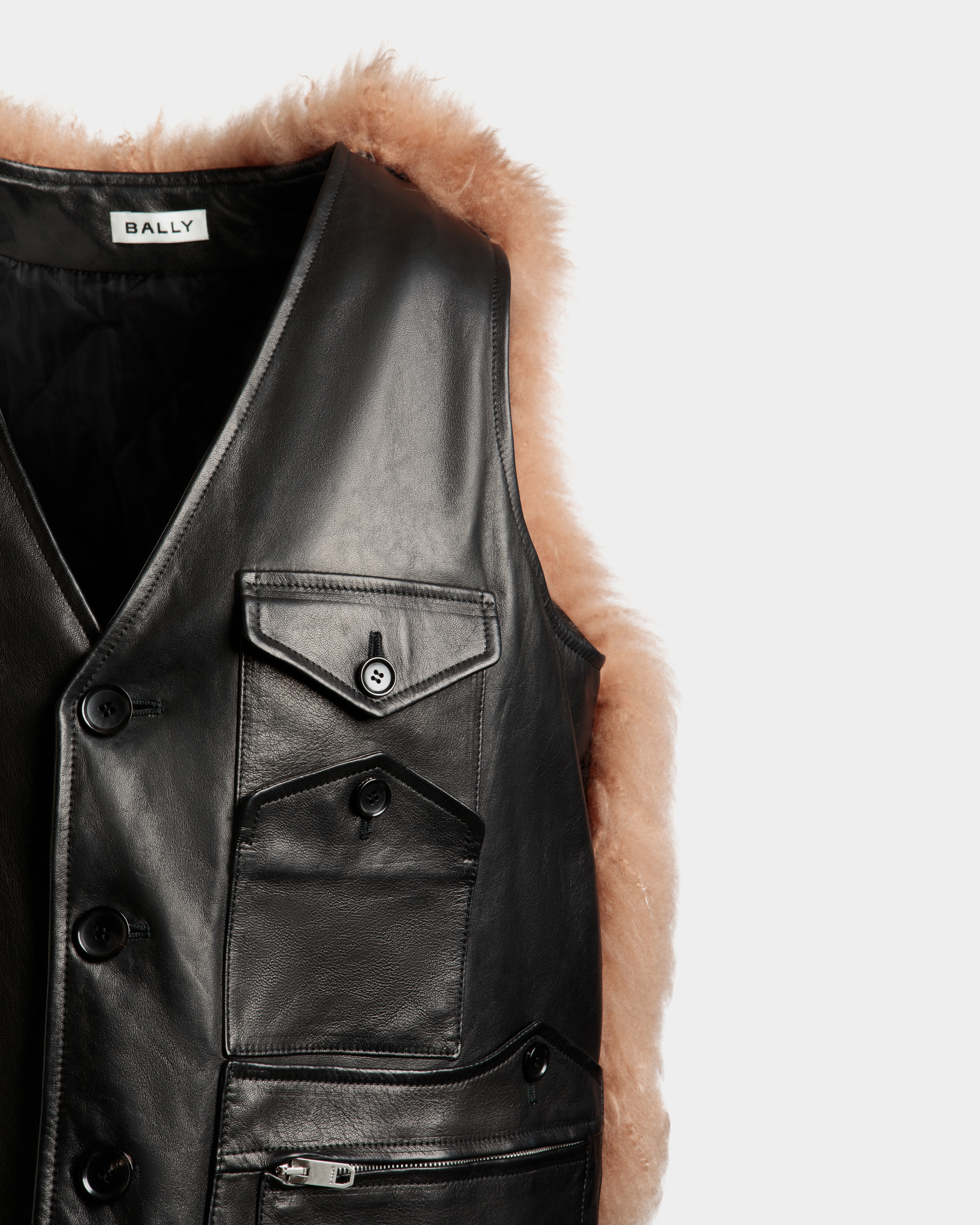 Vest With Shearling Insert In Black Leather