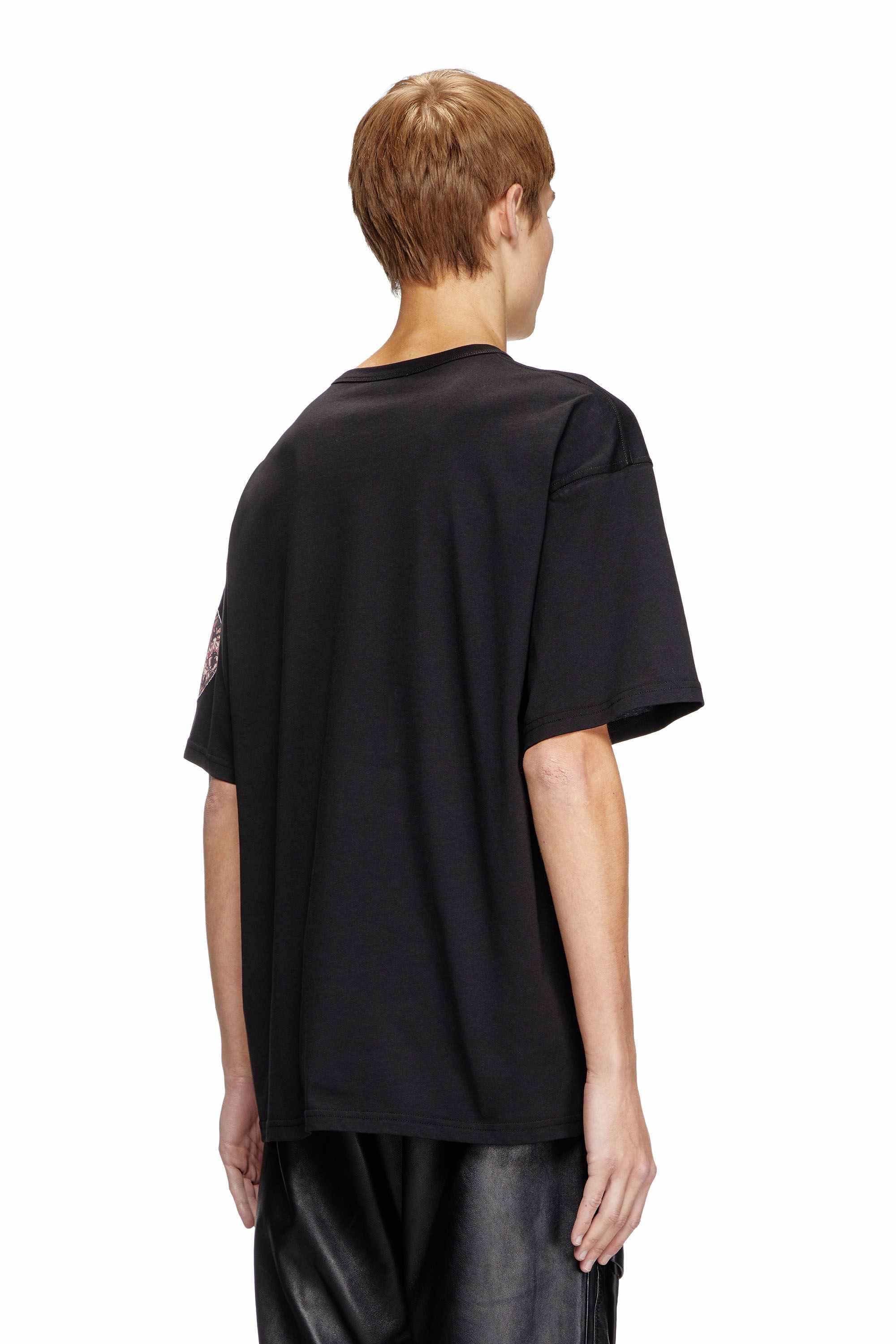 Black T-shirt with large gabardine patch logo
