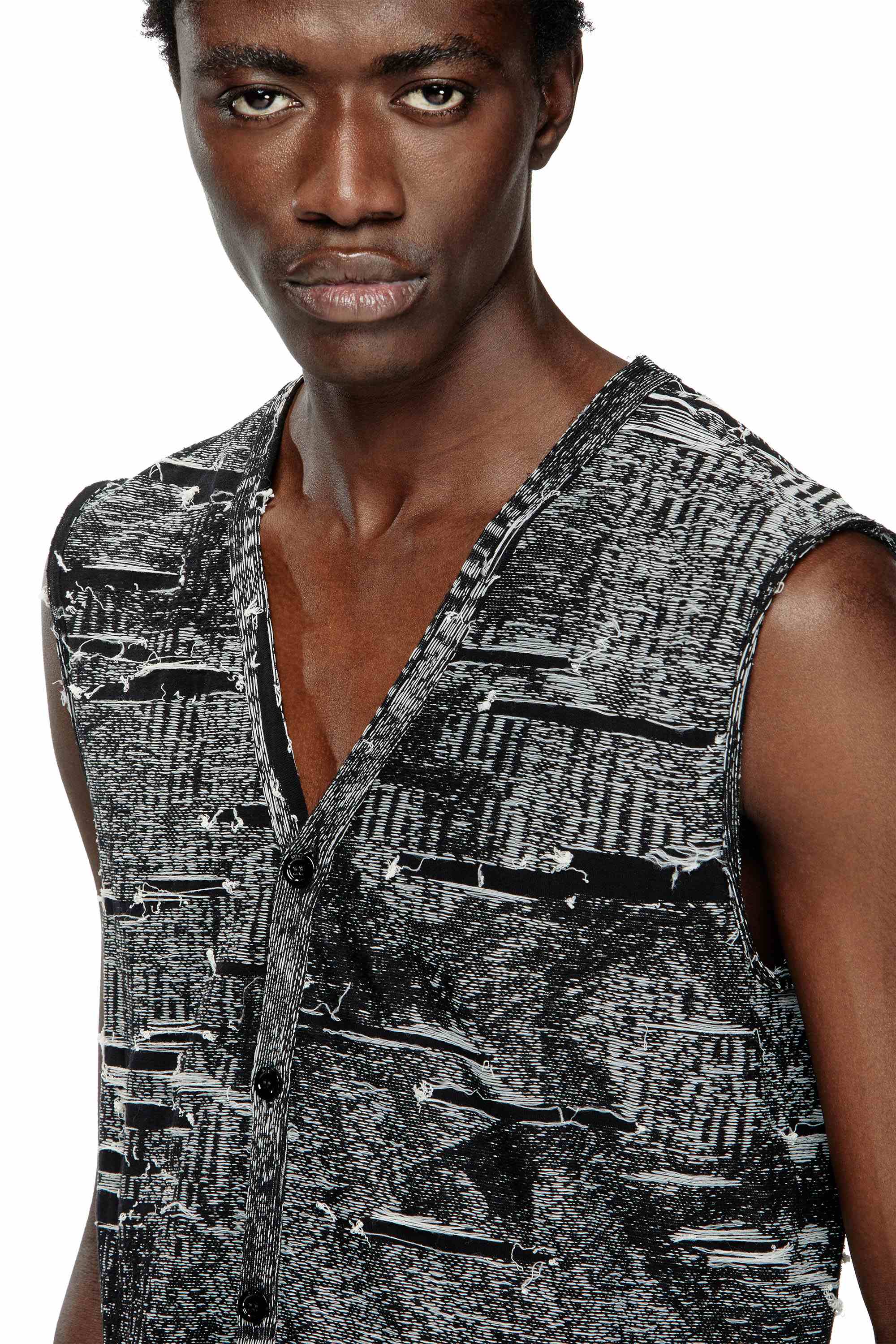 Black Vest with engineered distressing