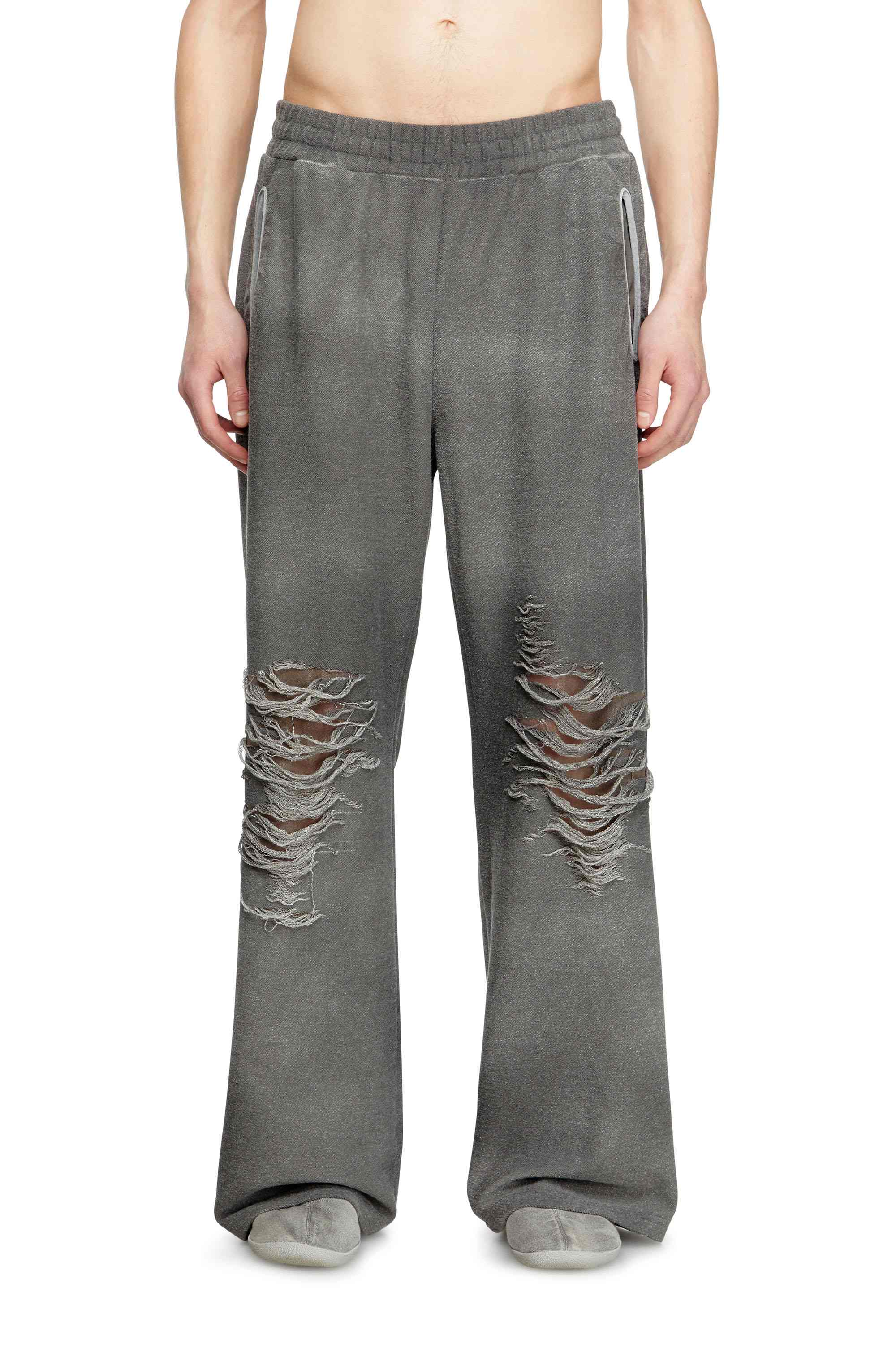 Grey Track pants with distressed front