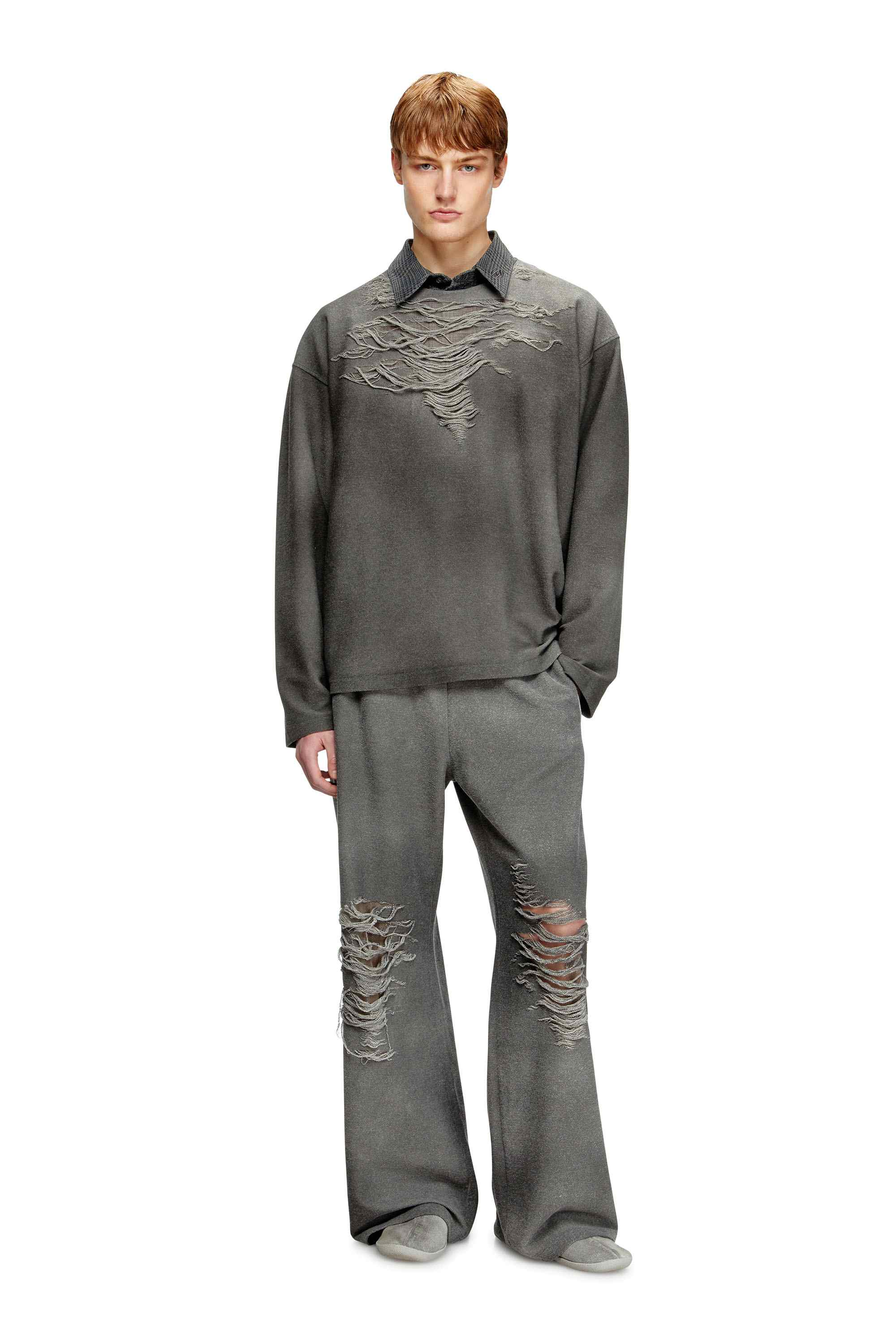 Grey Track pants with distressed front
