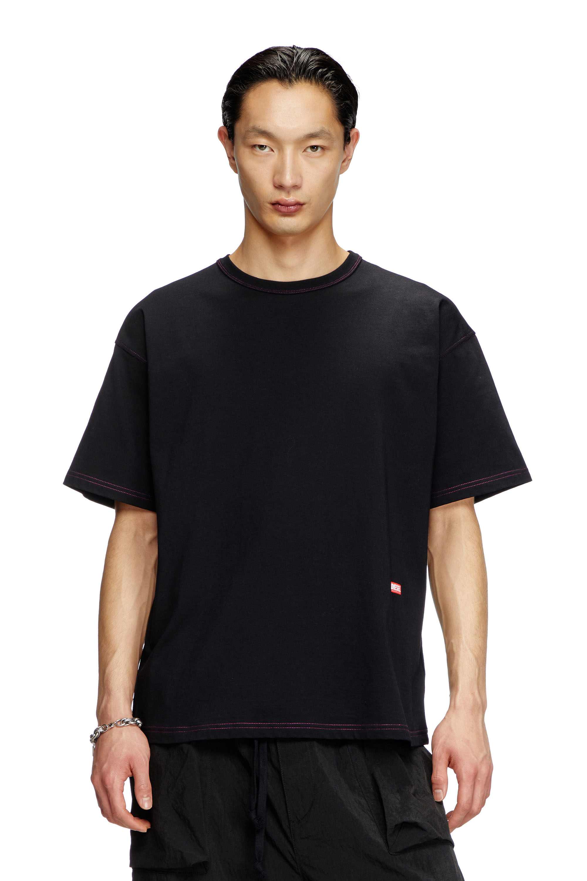 Black T-shirt with apple core print