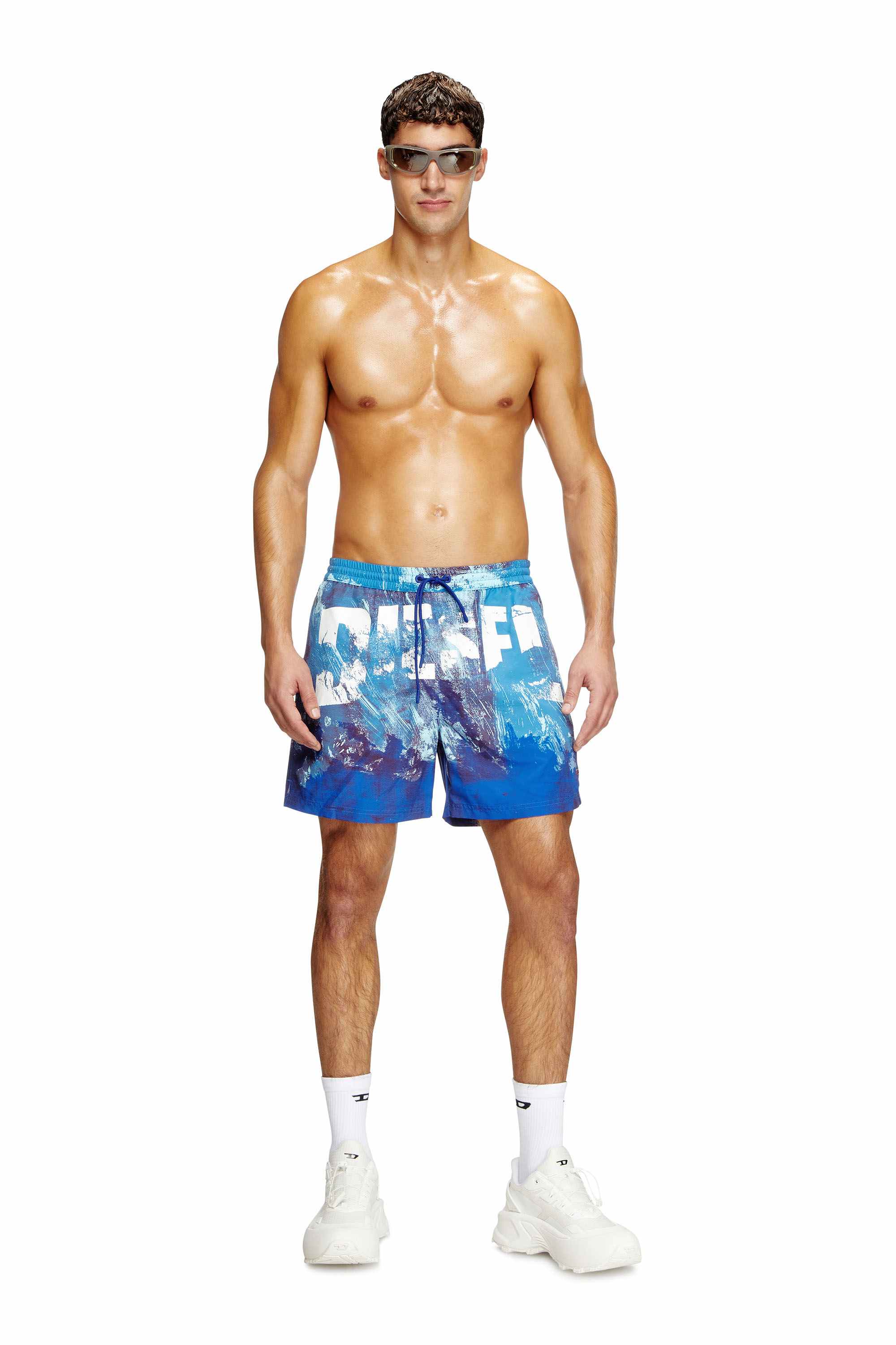 Blue Mid-length swim shorts with graphic print