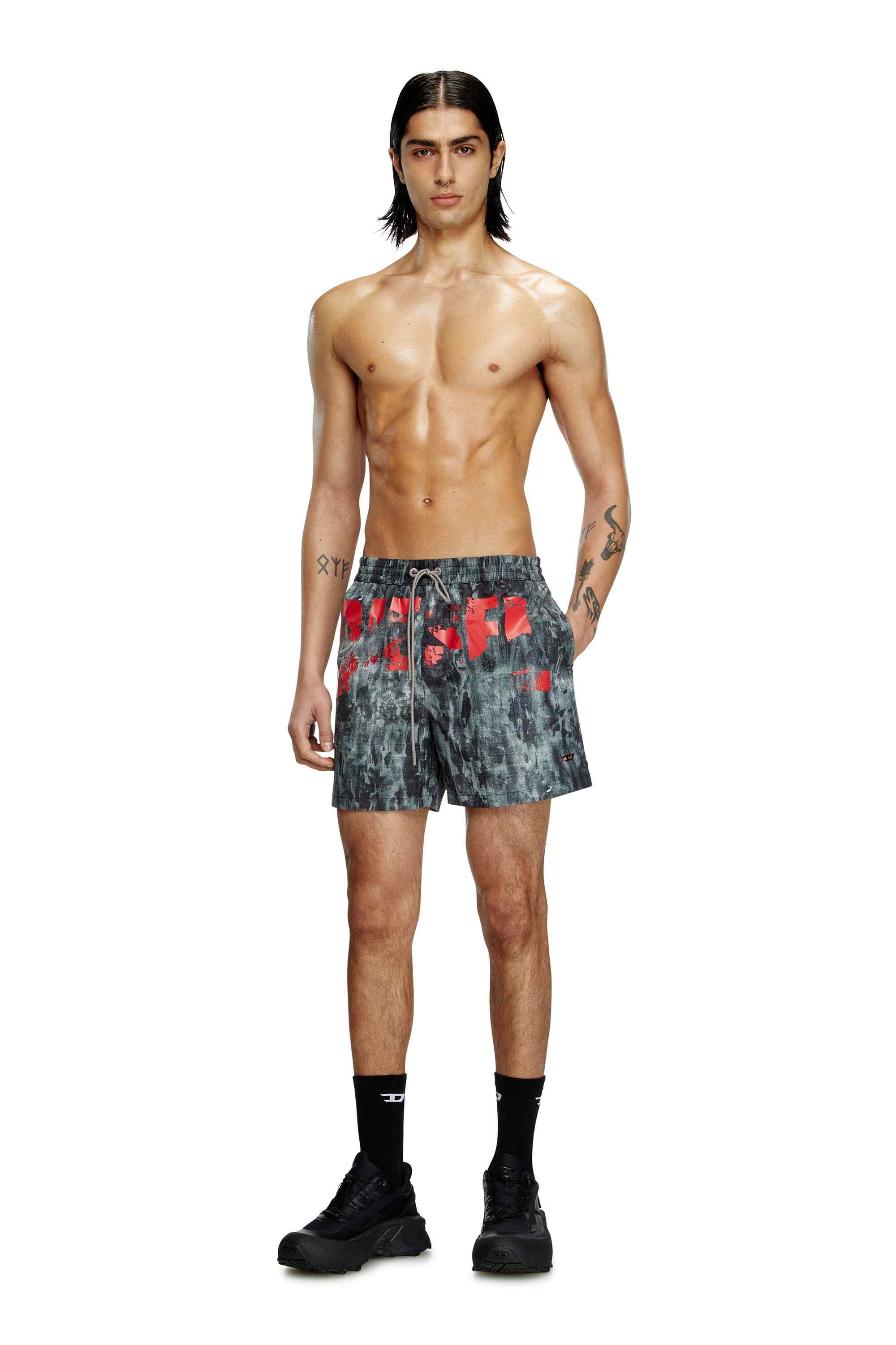 Black Mid-length swim shorts with graphic print