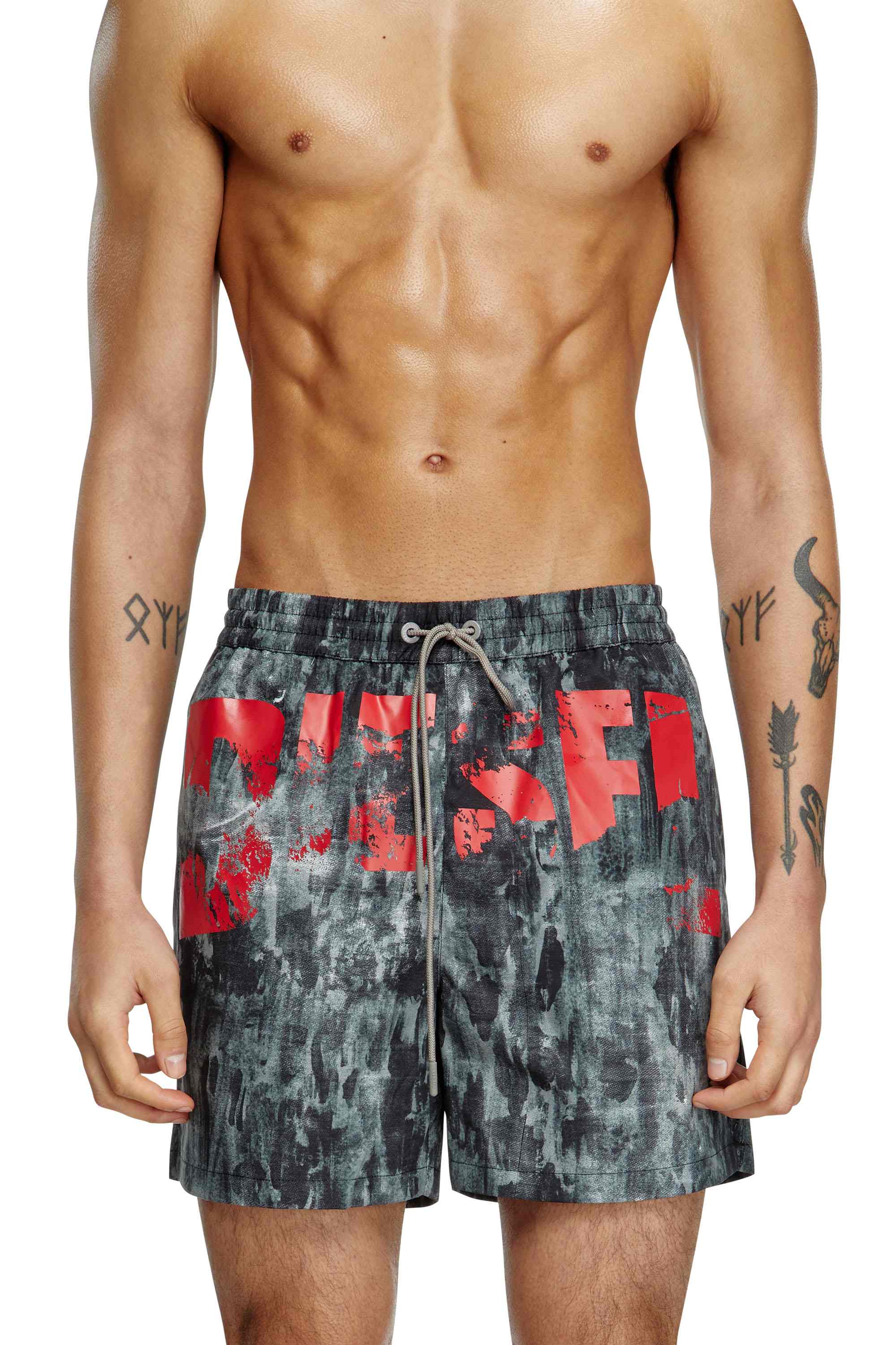 Black Mid-length swim shorts with graphic print