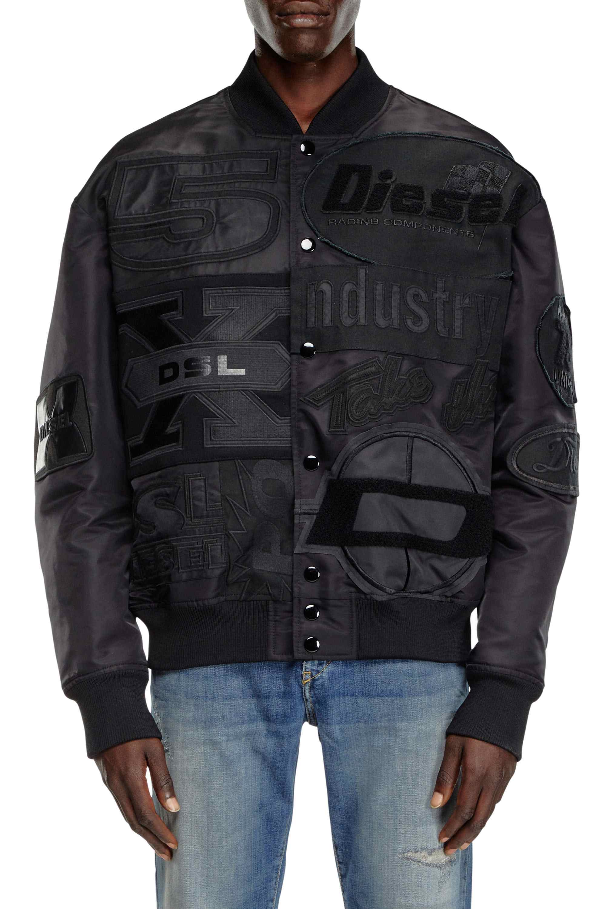 Black Bomber jacket with patches and embroidery
