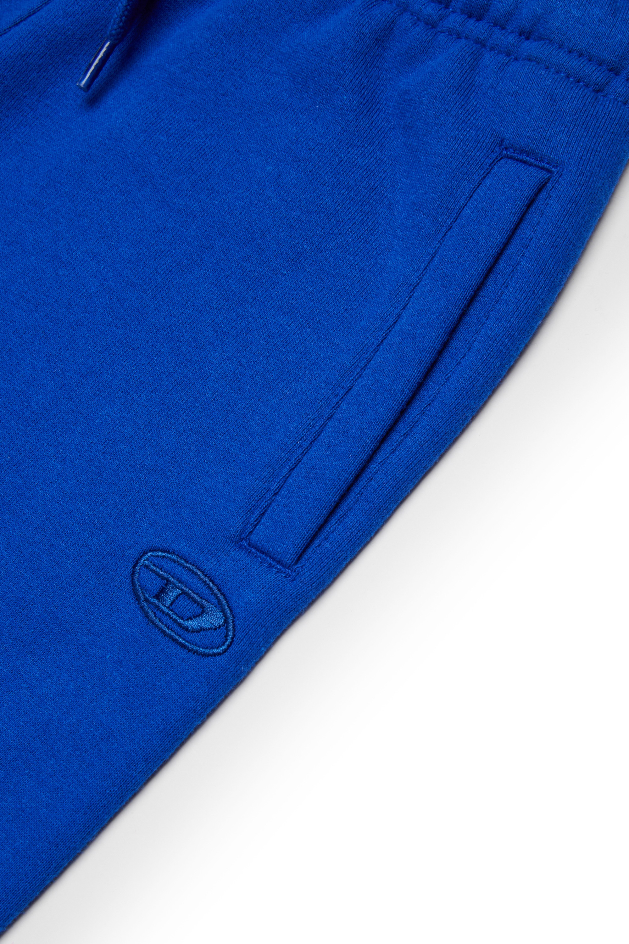 Blue Sweatpants with mega Oval D embroidery