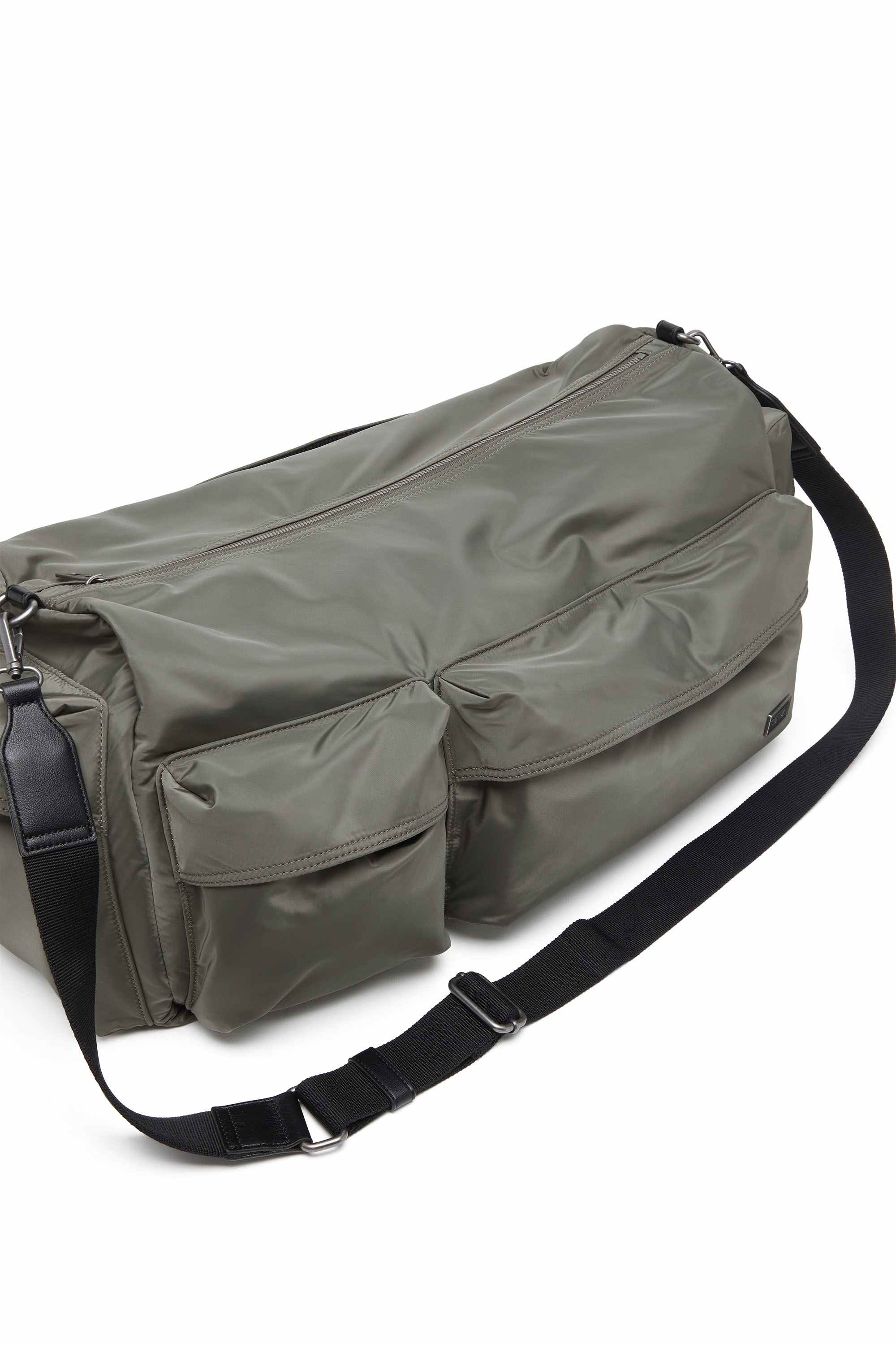 Green Multi-Pkts-Multipocket duffle bag in utilitarian shell