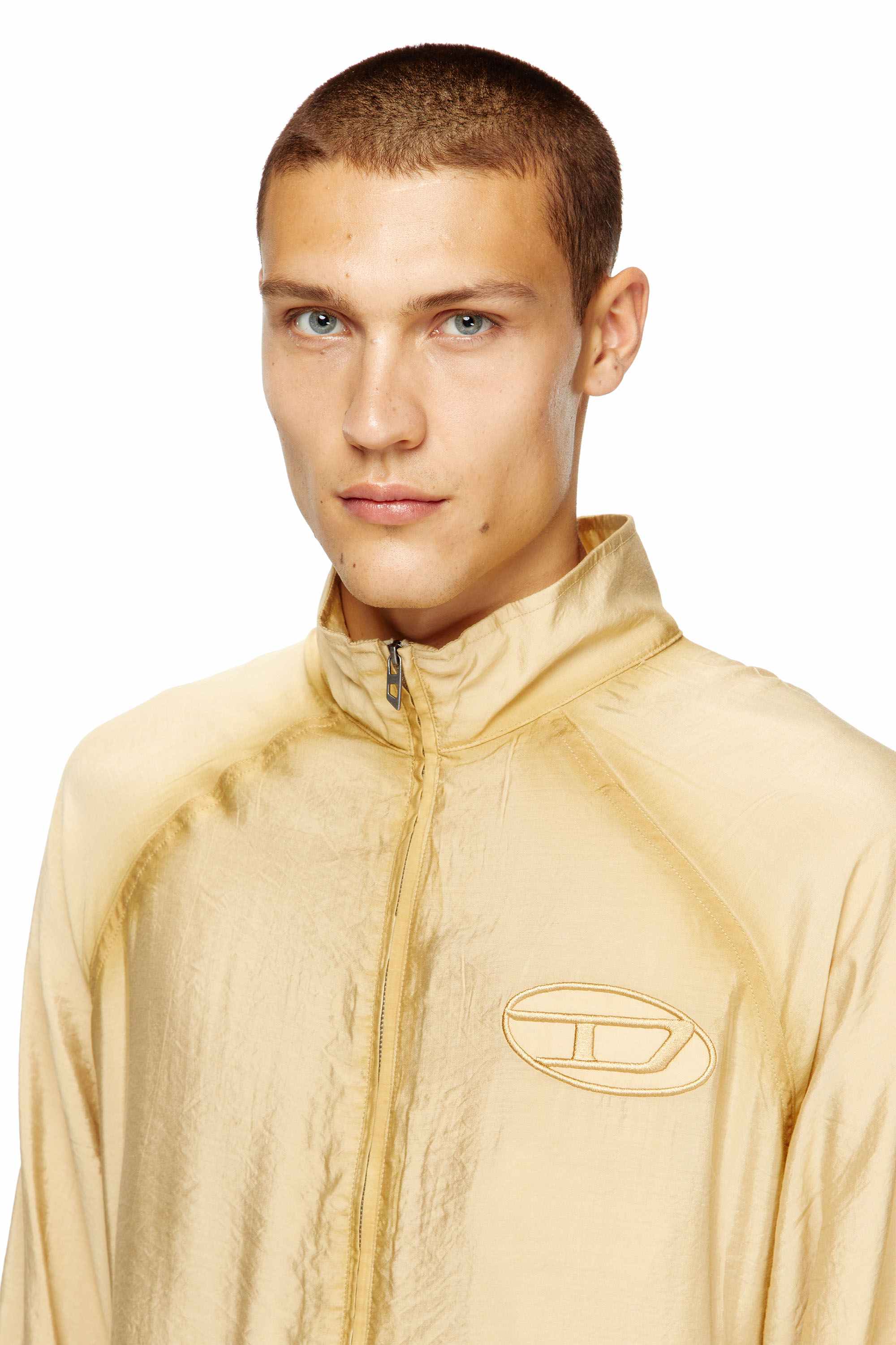 Beige Souvenir-style embroidered track jacket