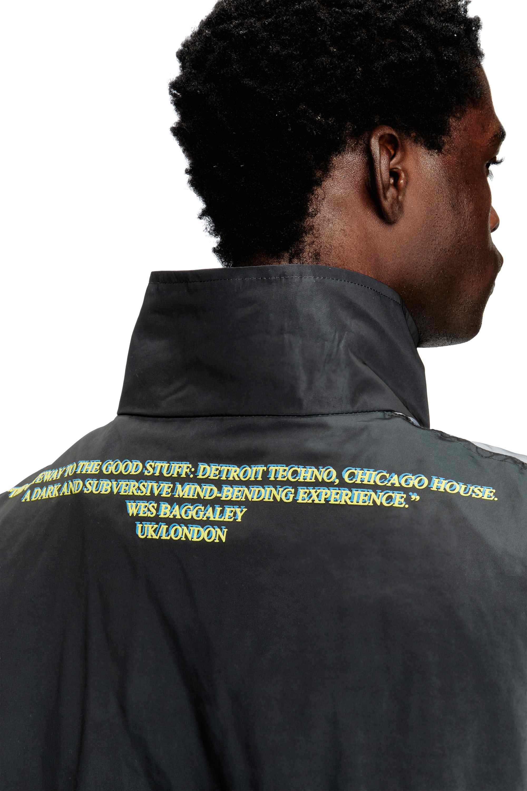 Black Tech-jersey jacket with lyrics print
