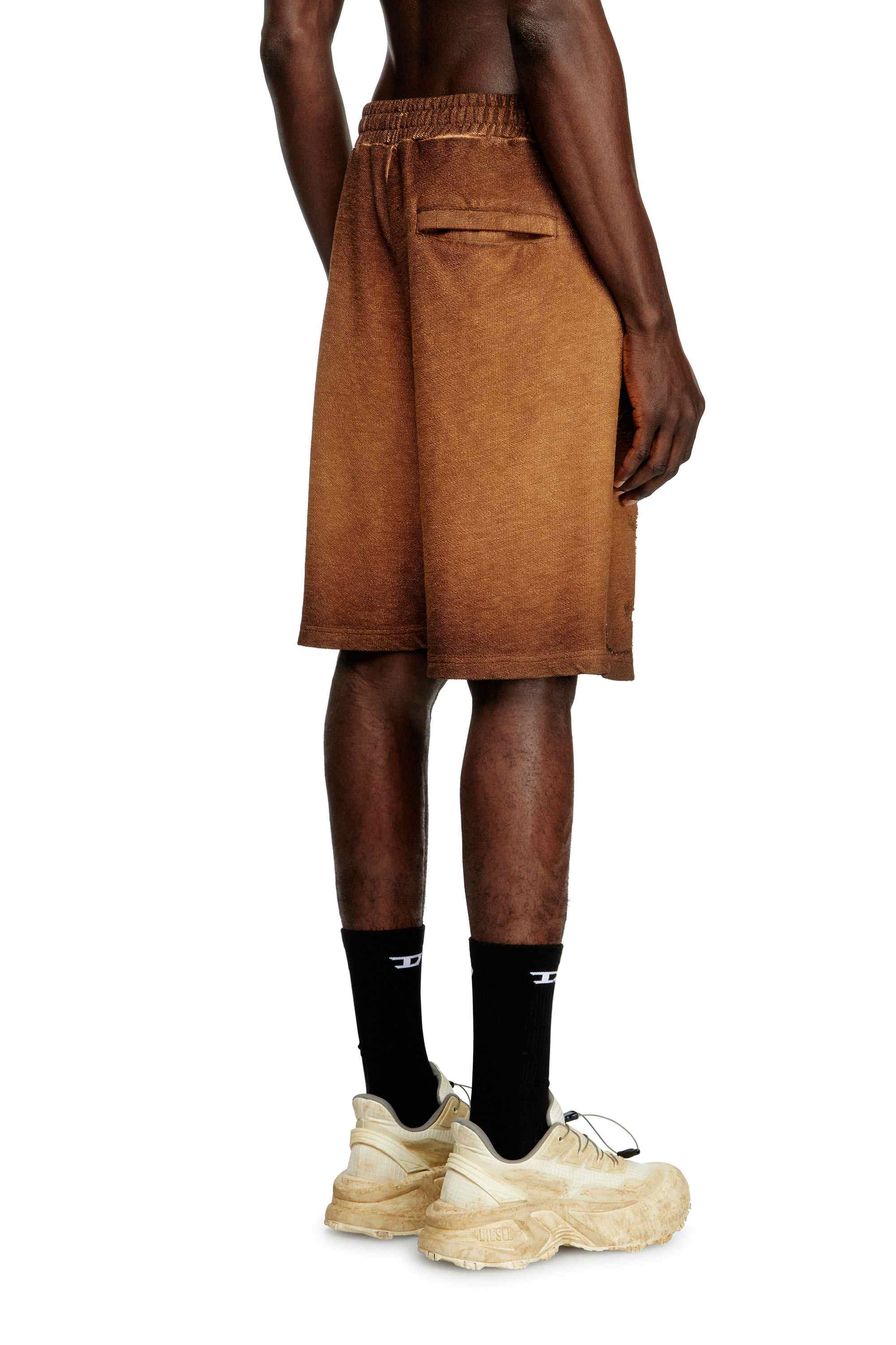 Brown Sweat shorts with phoenix devoré