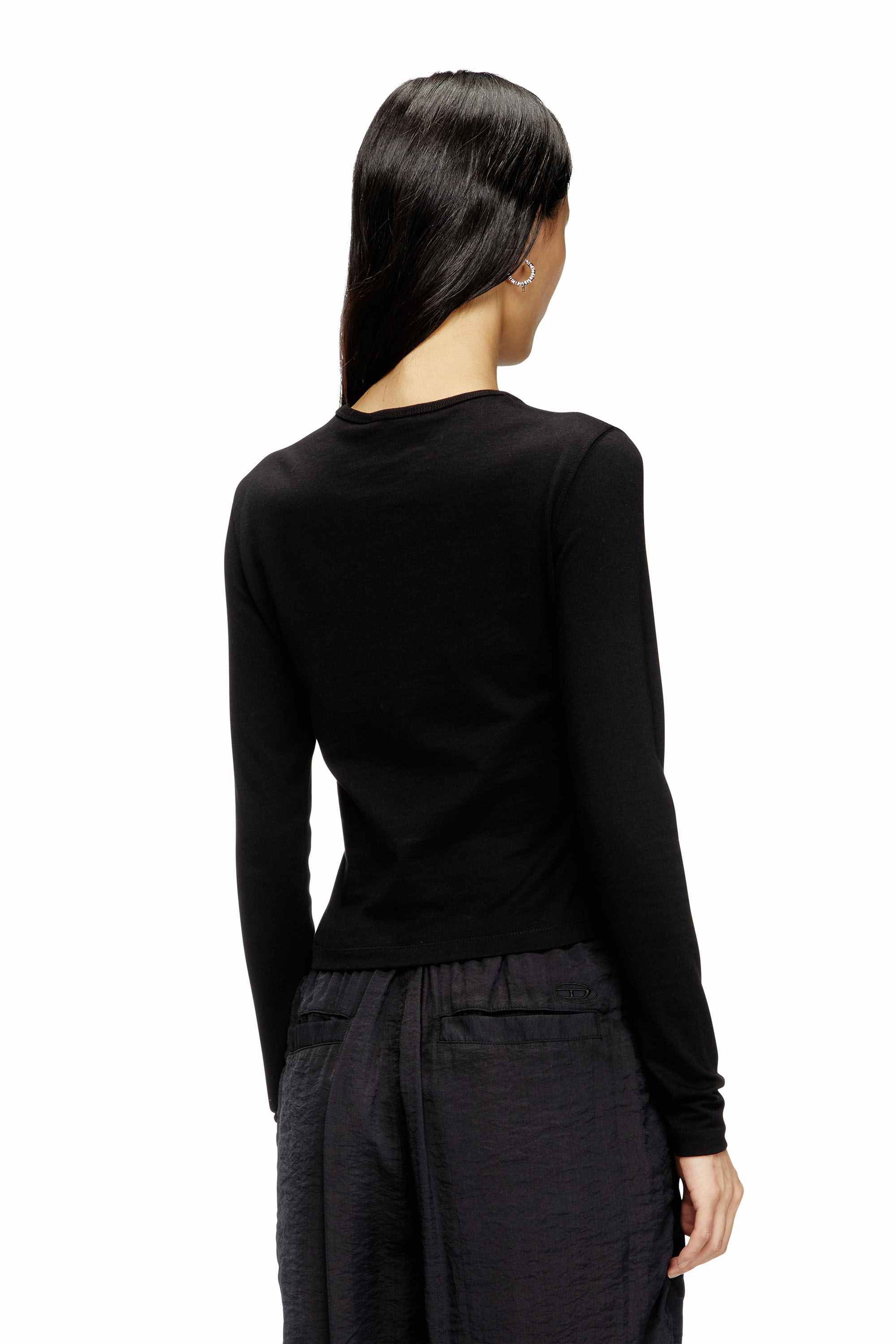 Black Long-sleeve top with Oval D cut-out