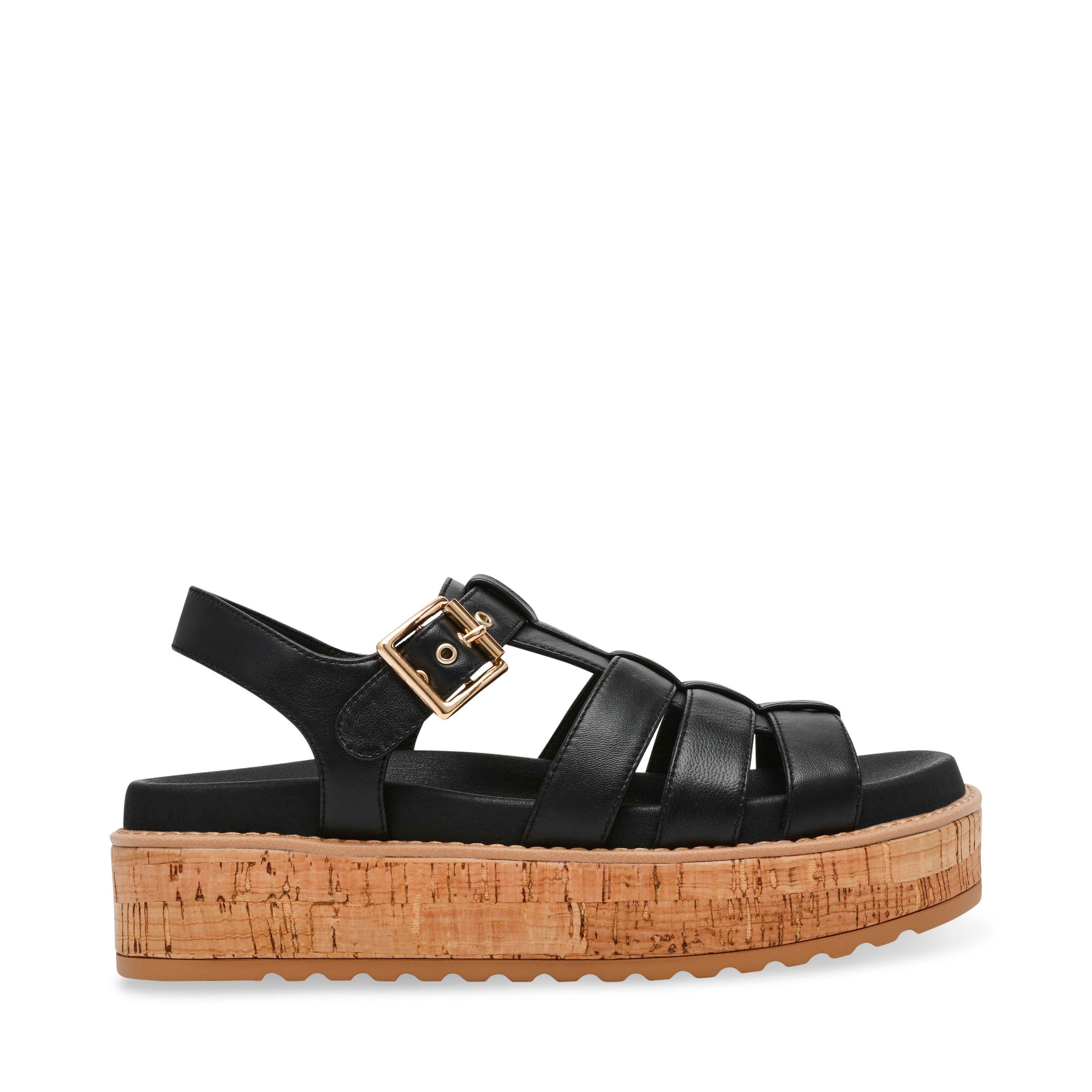 Busybee-In Black Leather Wedges