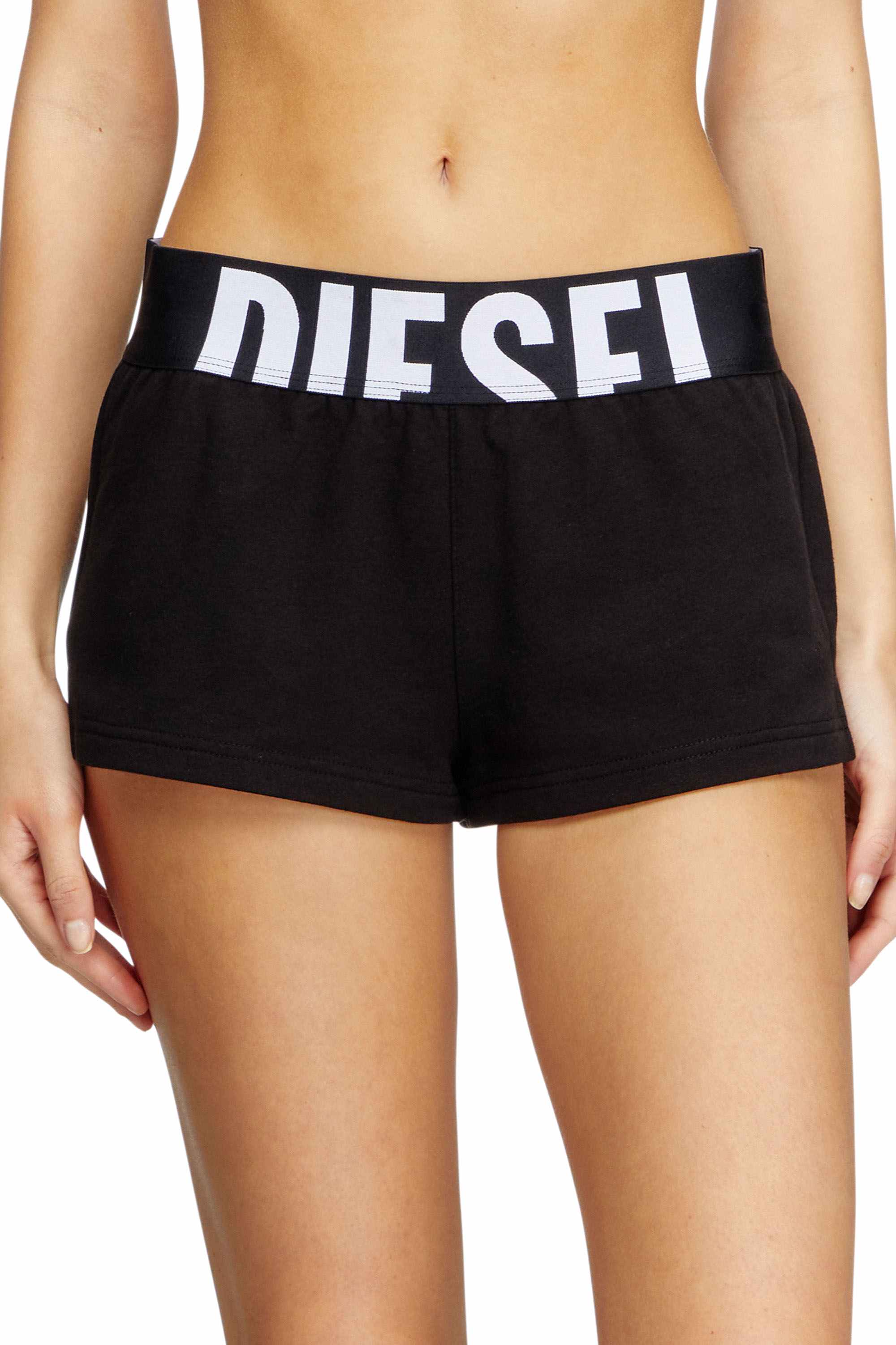 Black Terry cotton shorts with cut-off logo