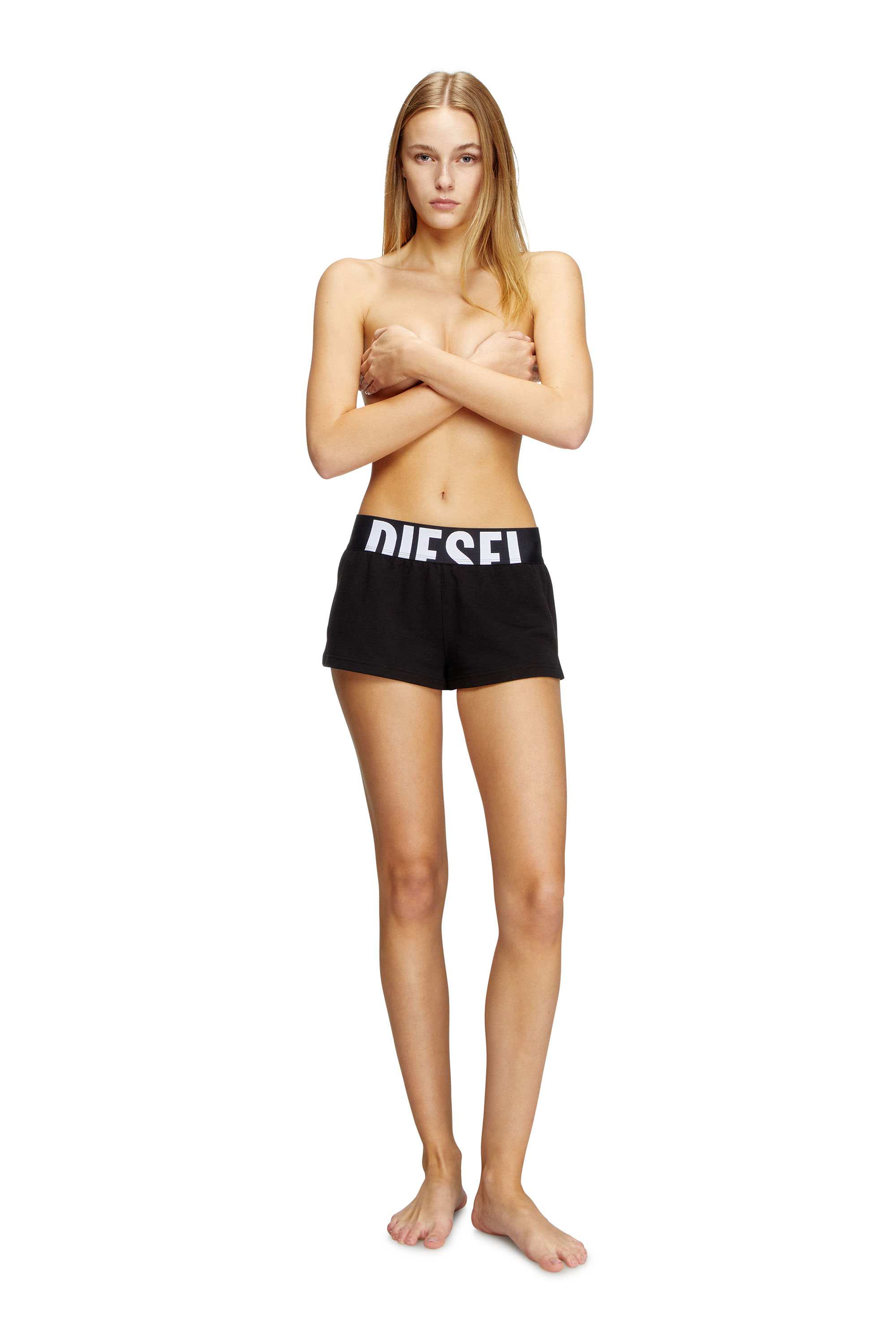 Black Terry cotton shorts with cut-off logo