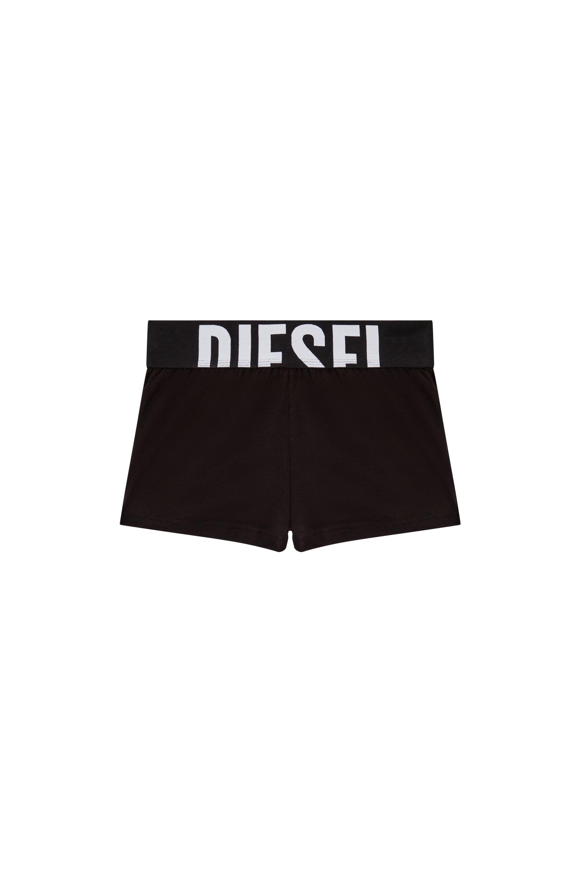 Black Terry cotton shorts with cut-off logo
