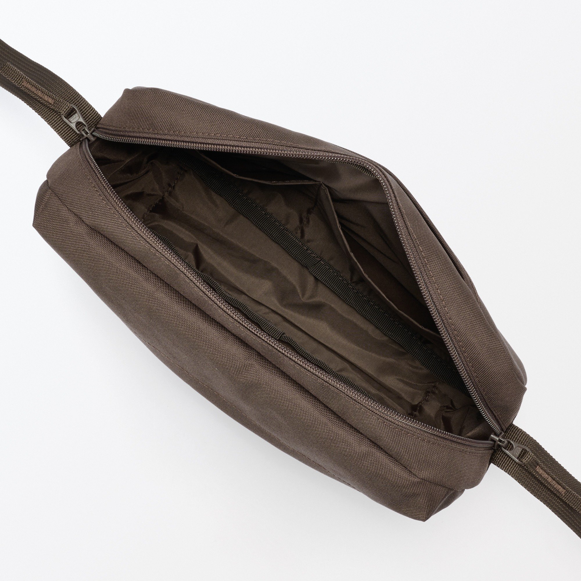 Water repellent shoulder bag with back pocket
