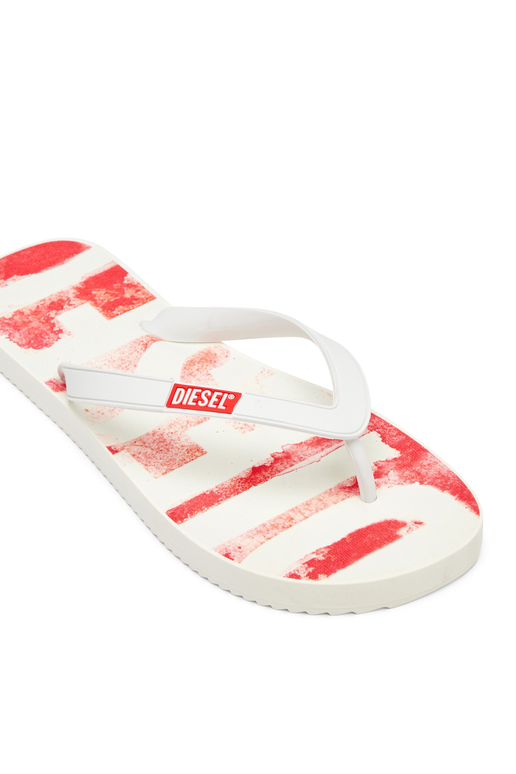White Sa-Rio-Rubber flip-flops with graffiti logo