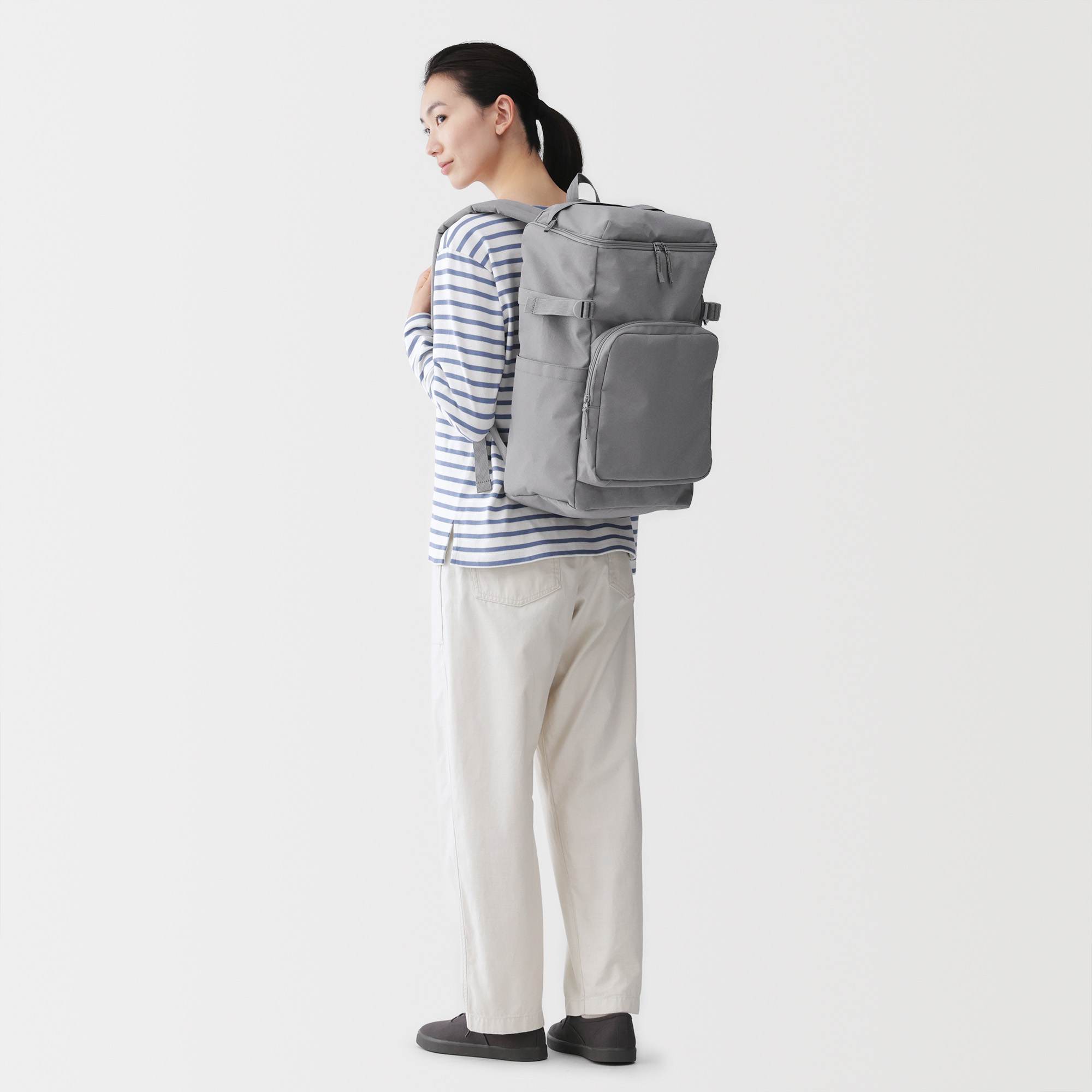 Fatigue reduction water repellent toploader backpack