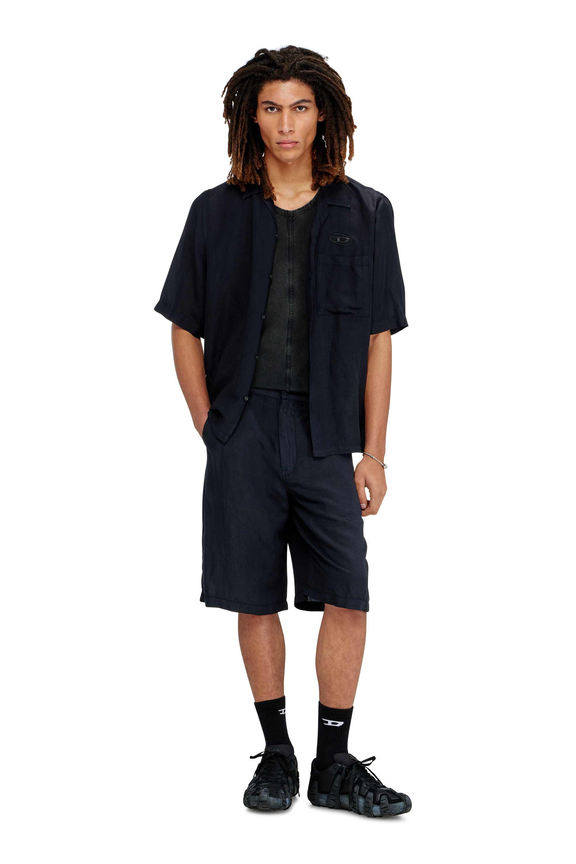 Black Bermuda shorts in garment-dye linen blend