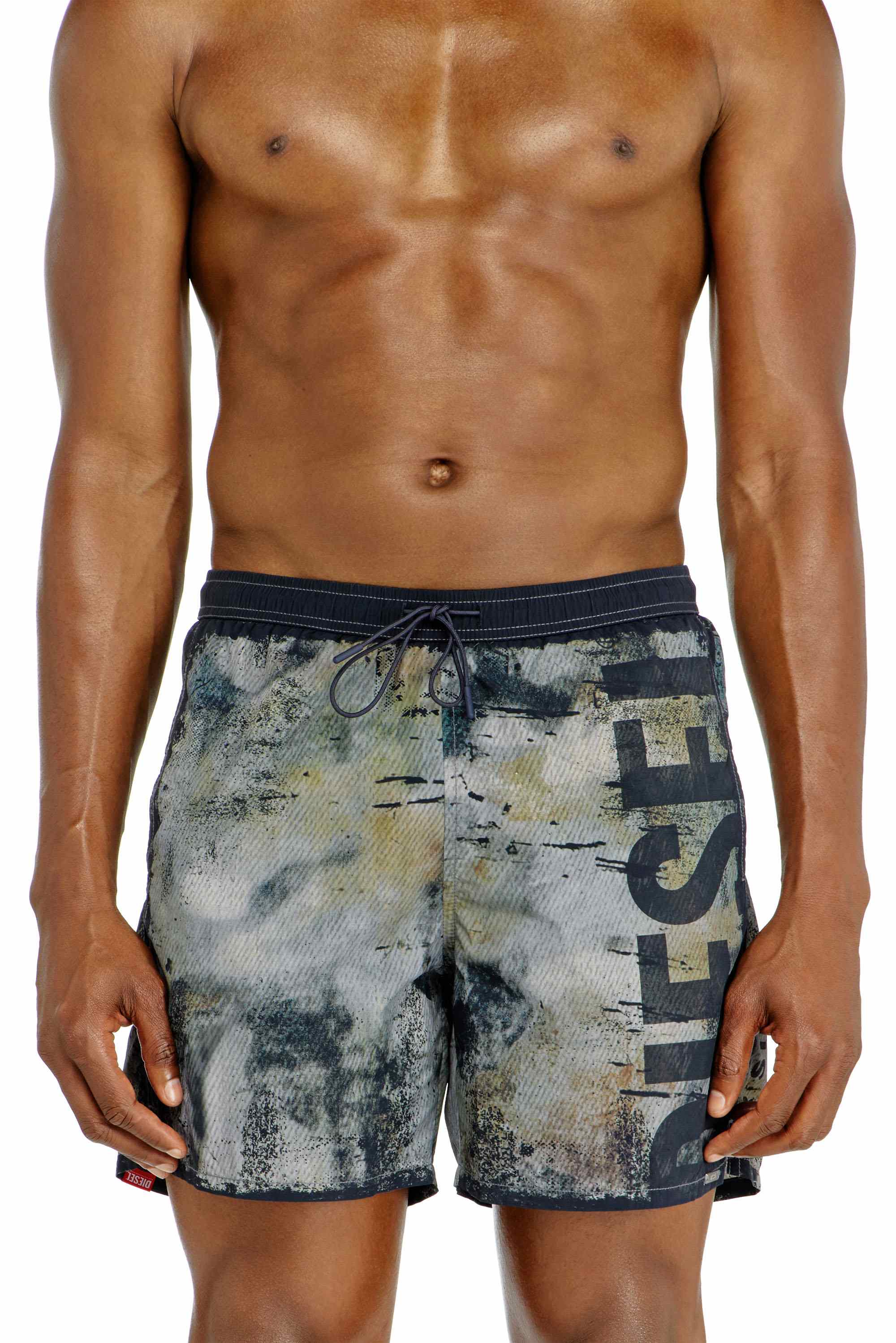 Green Swim shorts with distressed print and maxi logo