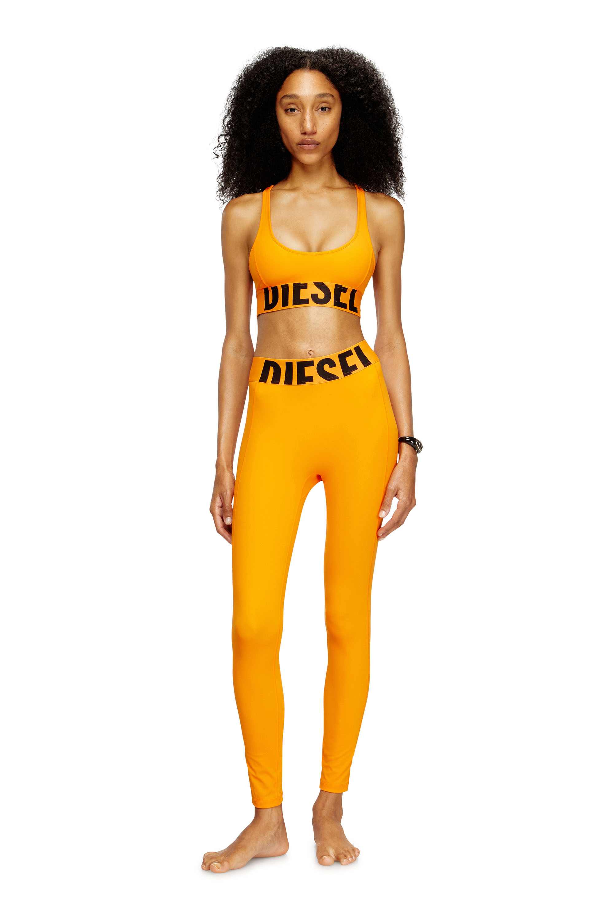 Orange Microfibre leggings with cut-off logo