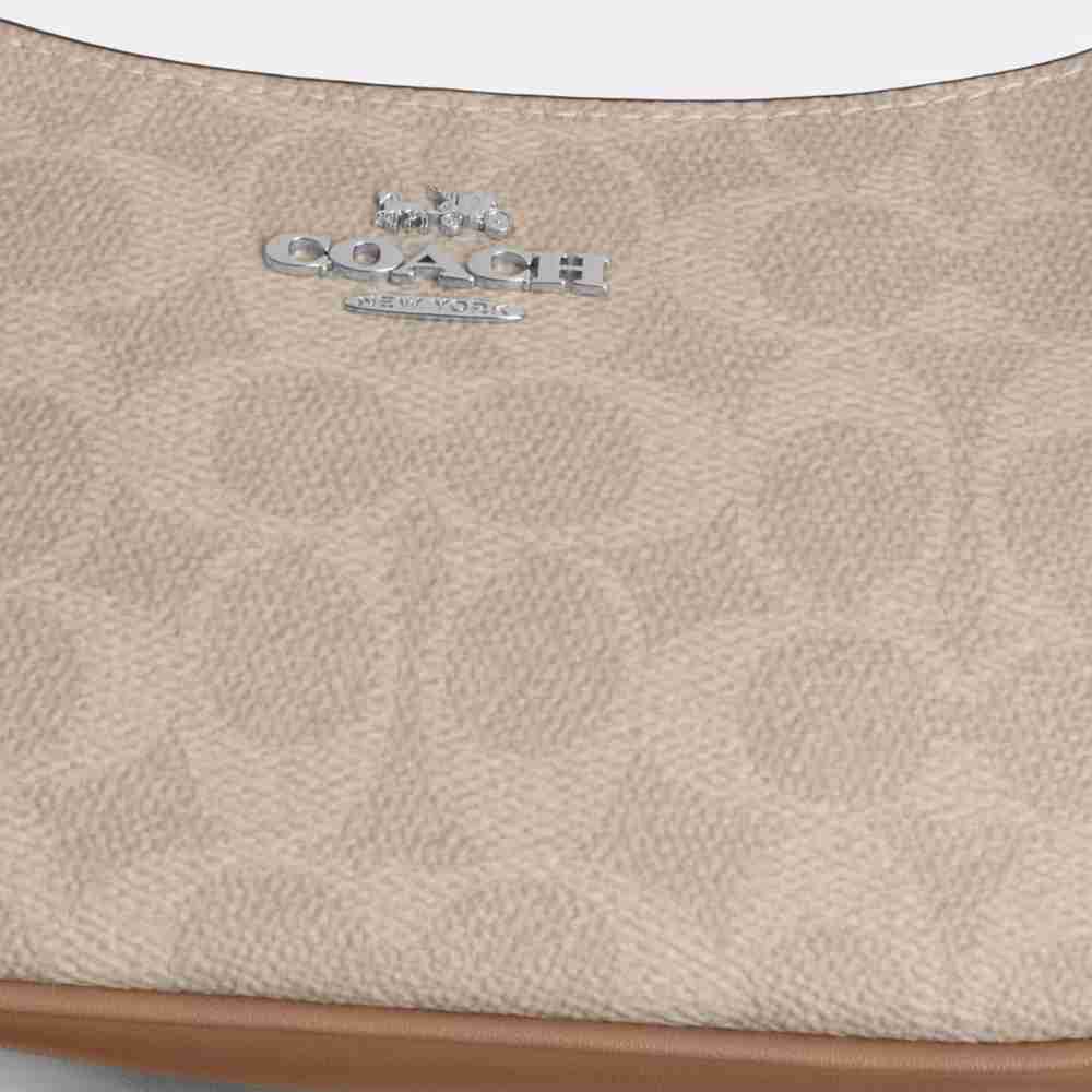 Teri Mini Crossbody Bag In Signature Canvas
