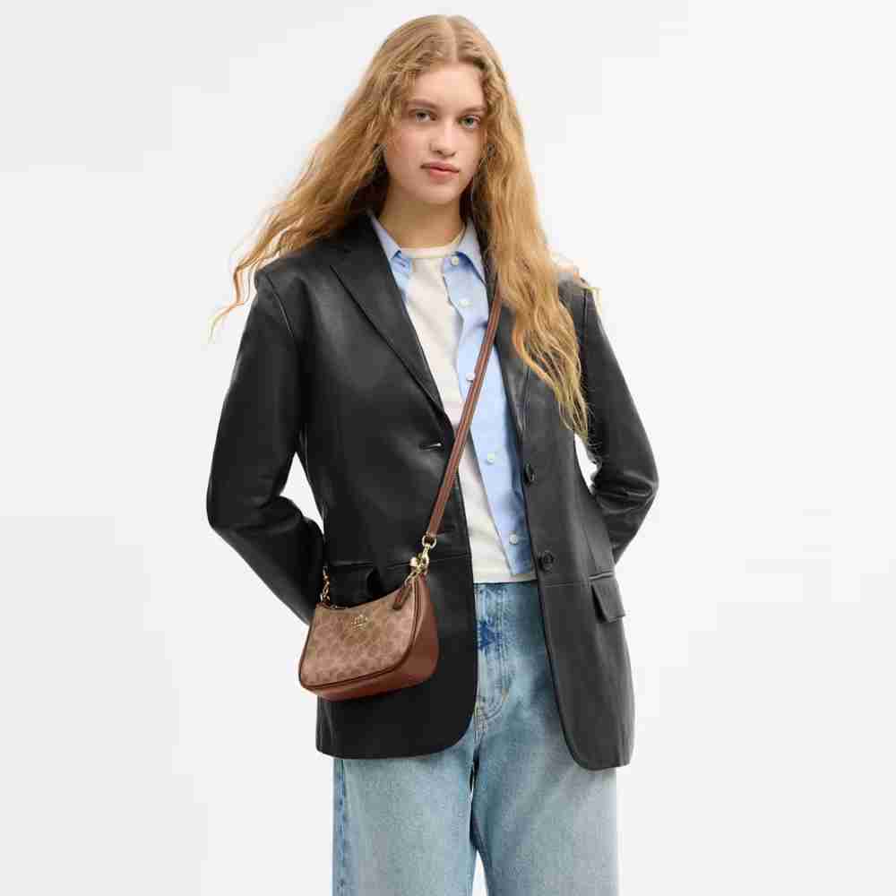 Teri Mini Crossbody Bag In Signature Canvas