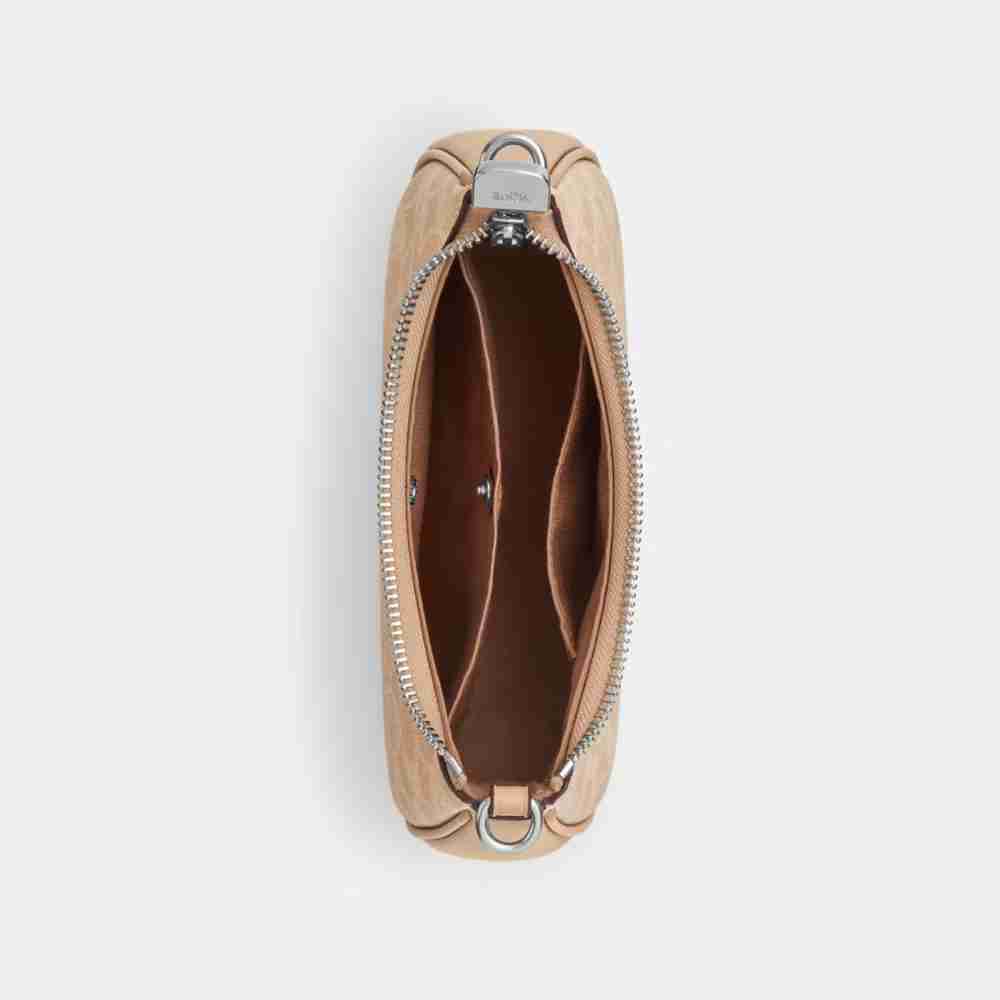 Teri Mini Crossbody Bag In Signature Canvas
