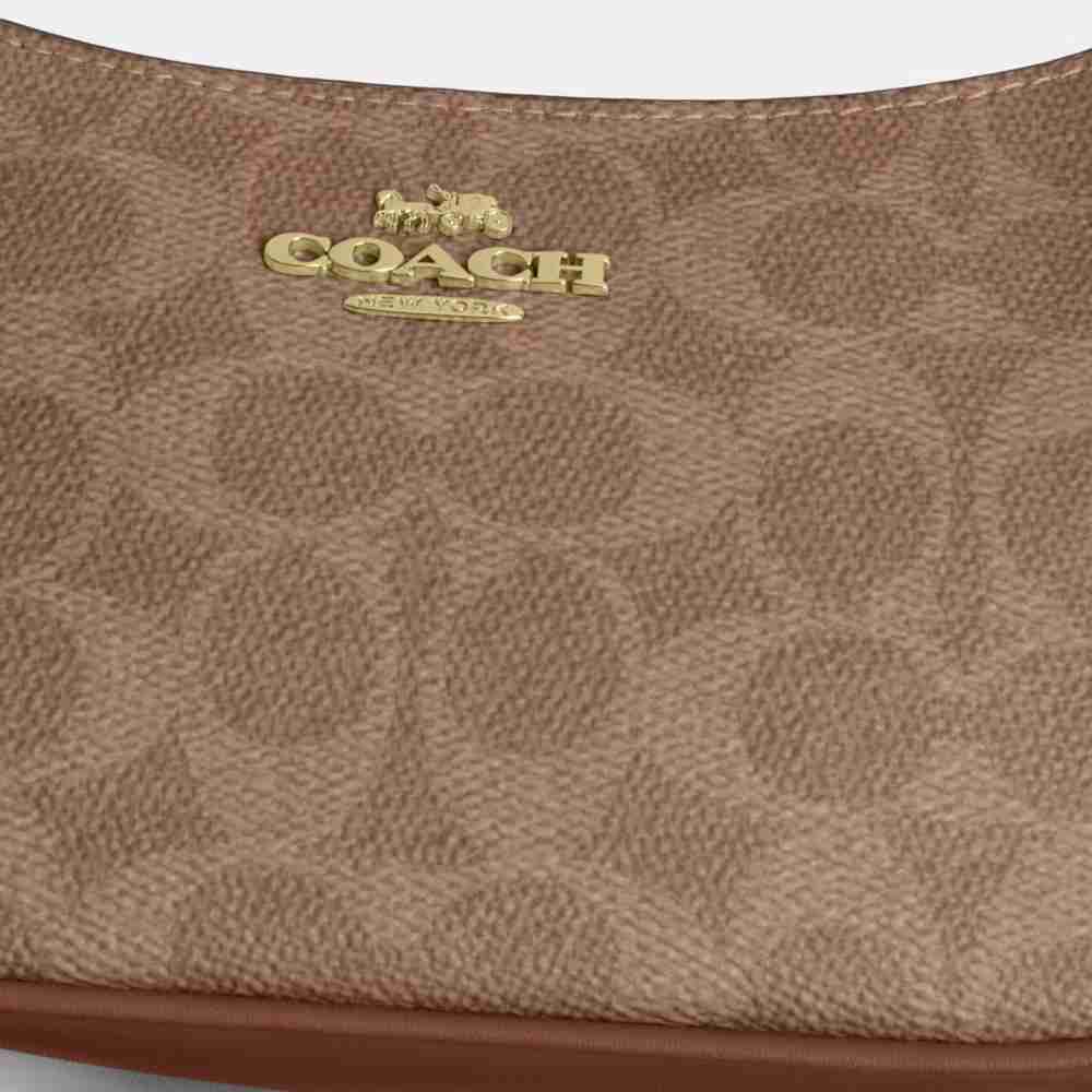 Teri Mini Crossbody Bag In Signature Canvas