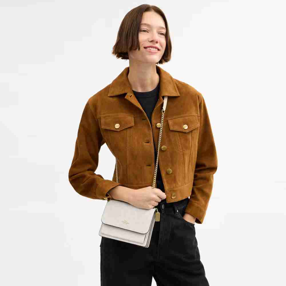 Mini Klare Crossbody Bag In Signature Canvas
